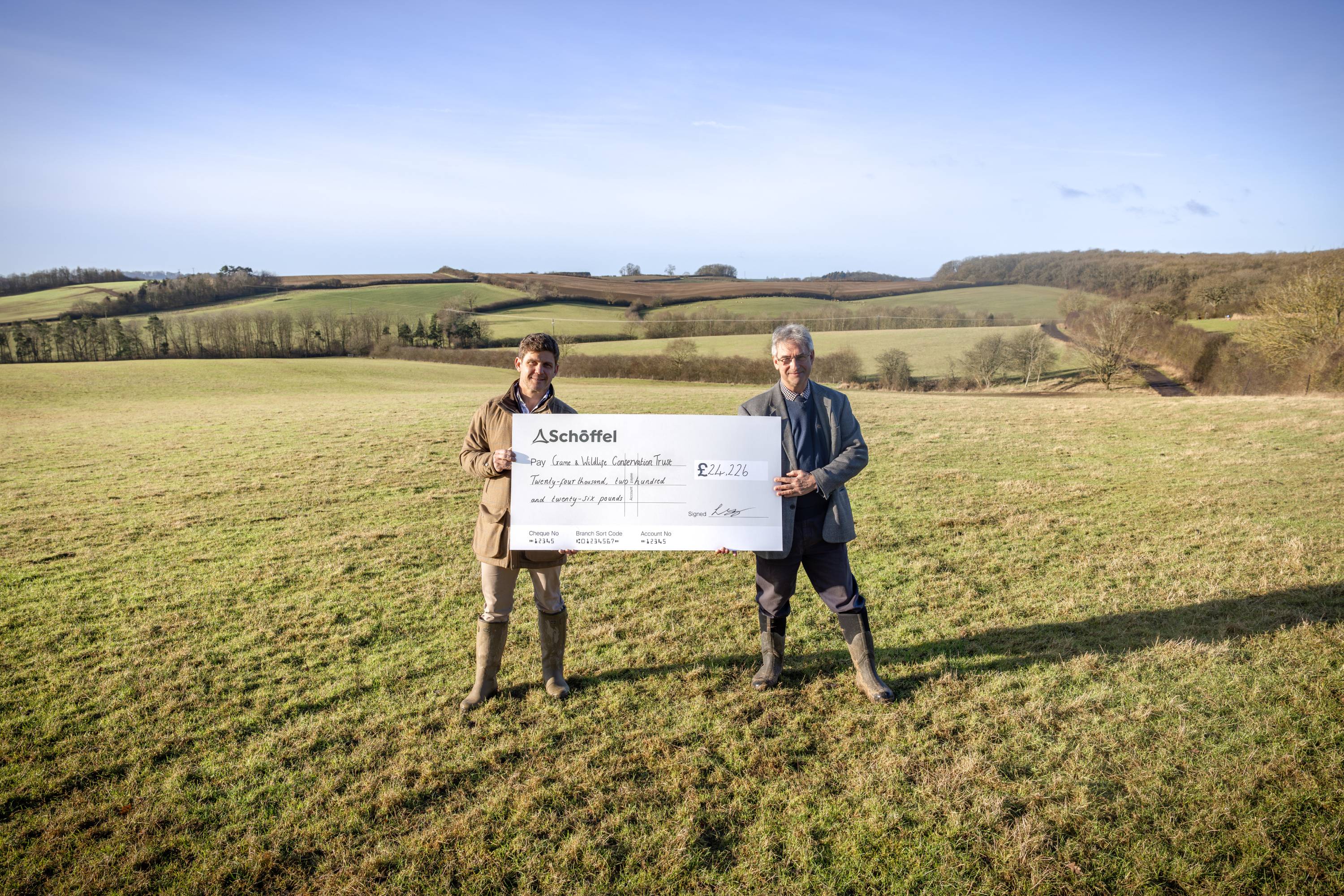 Image shows the cheque handover of the gwct giveback.