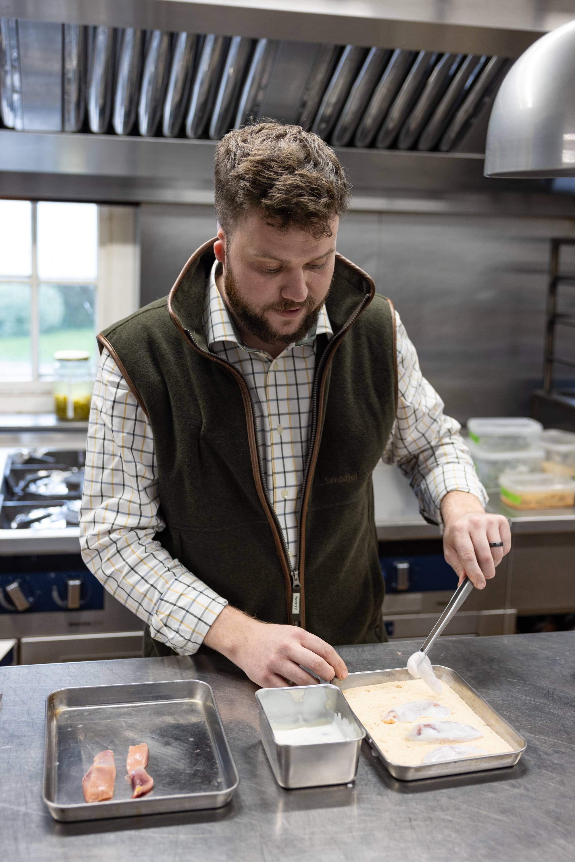 A very simple way to cook pheasant breast. The pheasant strips are being dipped in buttermilk.