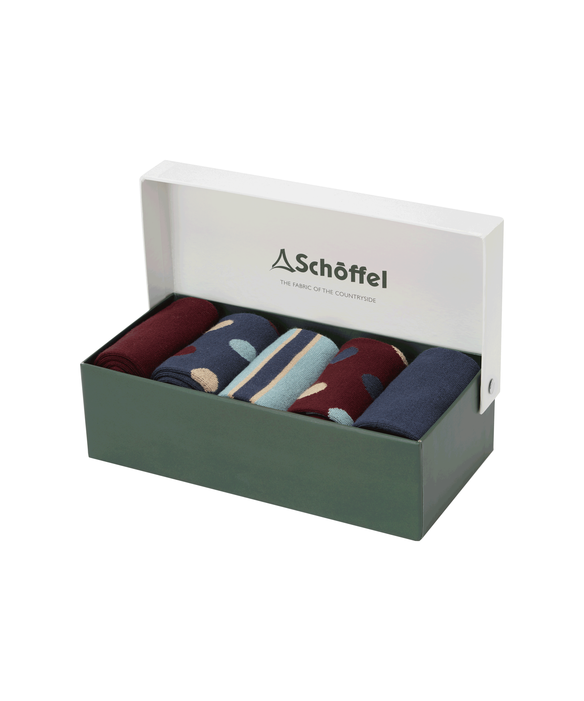 A dark green box with a white lid partially open, displaying the Schöffel Bamboo Sock Box of 5 for Men in Blue inside. The socks come in different designs: one pair in solid burgundy, another navy blue with beige and burgundy polka dots, a light blue pair with beige and navy stripes, a burgundy pair with beige and navy polka dots, and a solid navy blue pair. The inside of the lid features the "Schöffel" logo and the tagline "The Fabric of the Countryside."