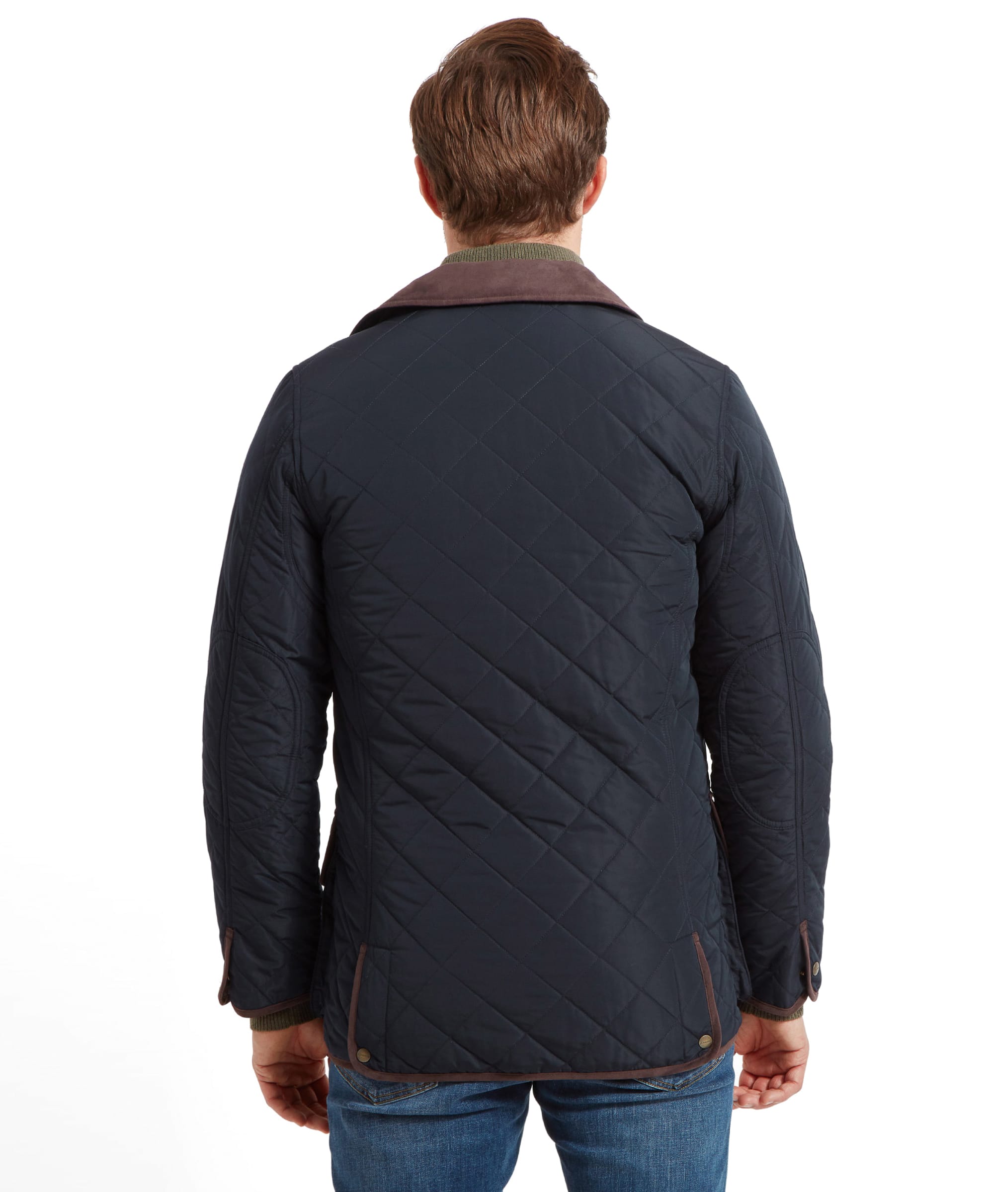 Back view of the man in the Schöffel Barrowden Quilt Jacket for Men in Blue, showcasing the quilted pattern and collar detail.