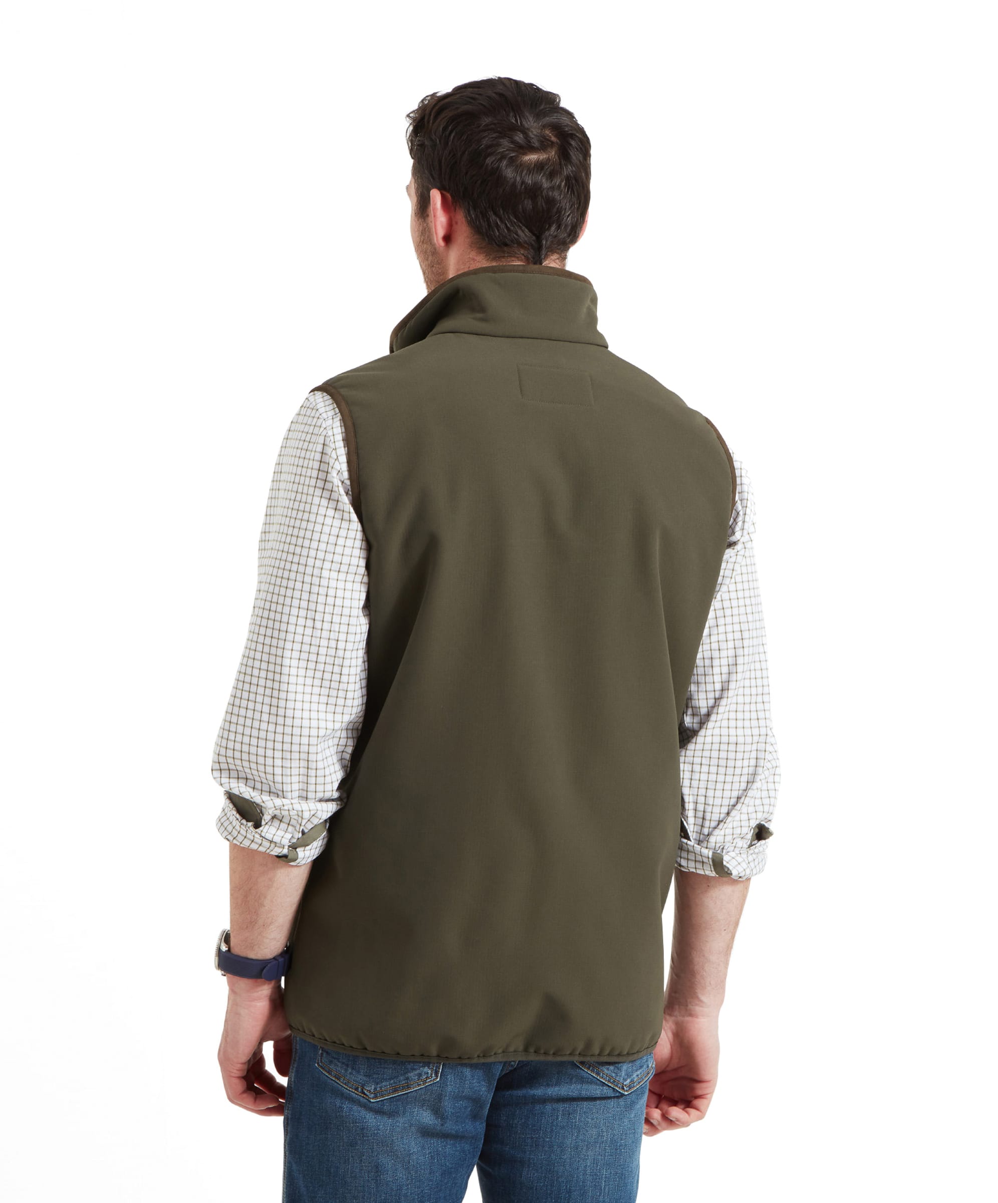 The back view of the man wearing the Schöffel Belton Gilet for Men in Green, showcasing the fit and design from behind.