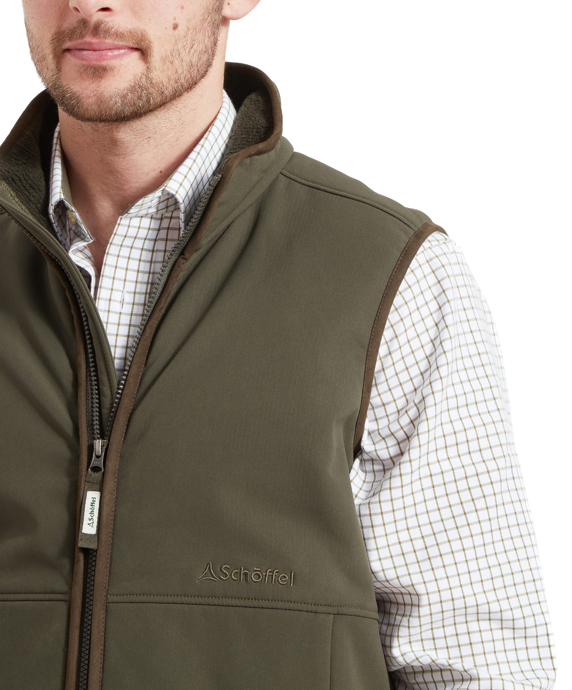 A close-up of the upper part of the Schöffel Belton Gilet for Men in Green, focusing on the brand logo and zipper detail.