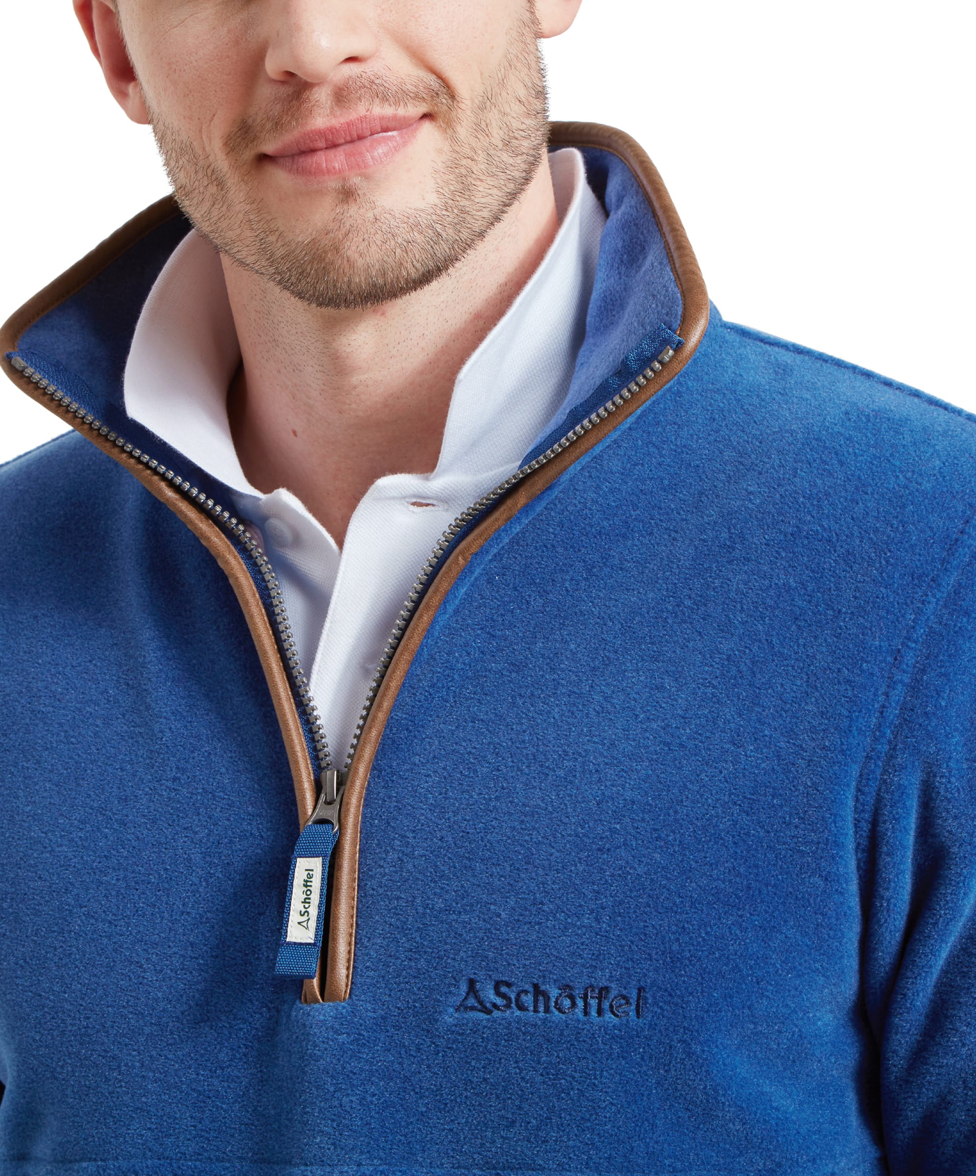 A close-up of the front of the Schöffel Berkeley Fleece 1/4 Zip Fleece for Men in Blue, focusing on the quarter-zip, collar, and the Schöffel logo embroidered on the left chest.