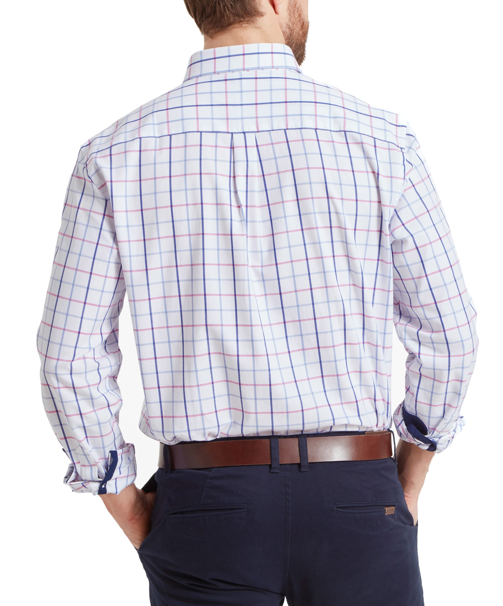 A back view of a man wearing the Schöffel Brancaster Classic Shirt for Men in Pink, highlighting the shirt's fit and check pattern, with the man’s hands in his pockets.