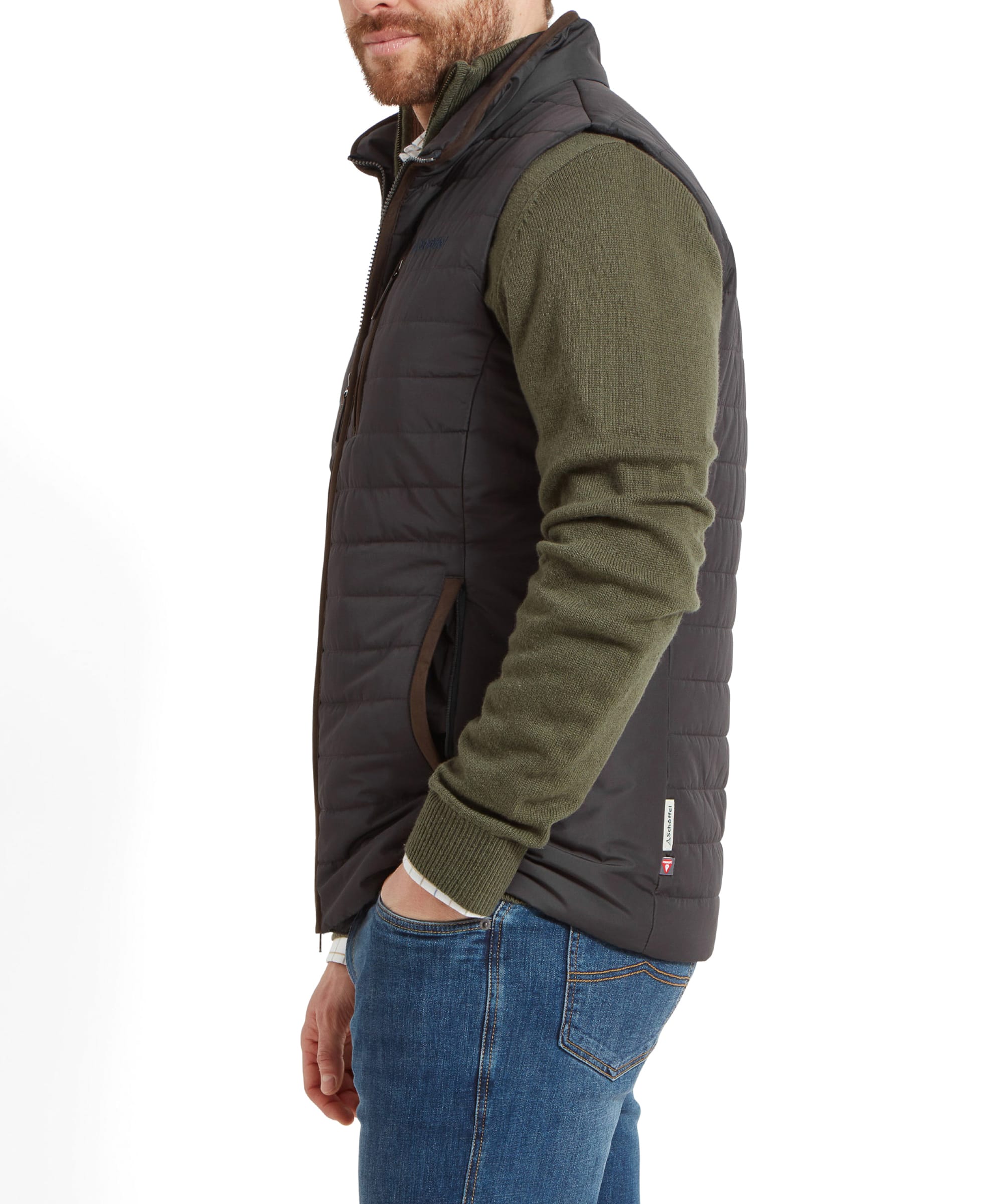 The side profile of the Schöffel Brora Gilet for Men in Grey showcases its quilted pattern and tailored fit, enhancing the overall appearance.