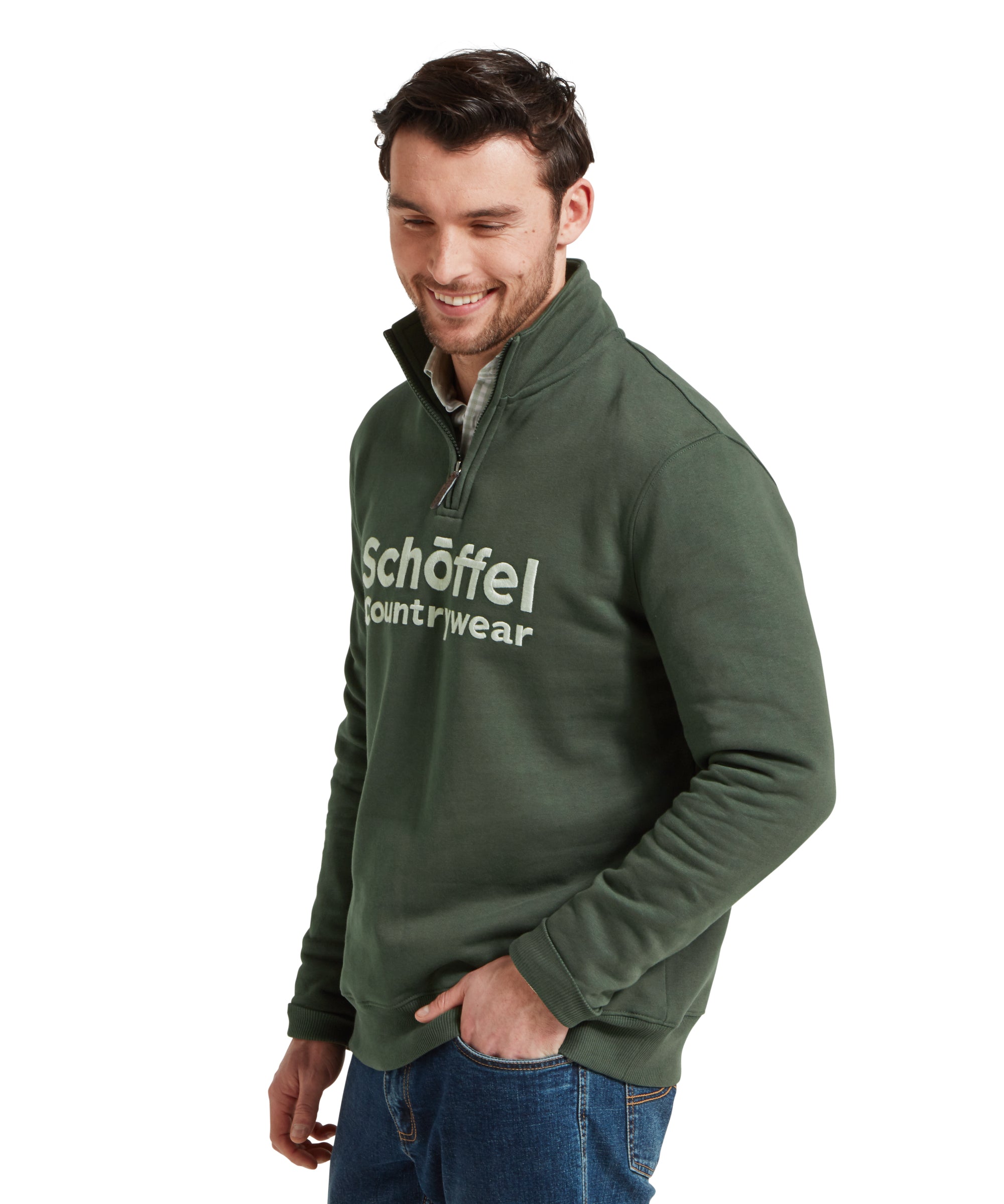 Side view of the man in the Schöffel Bude Sweatshirt for Men in Green, showing the detailed stitching on the sleeve.