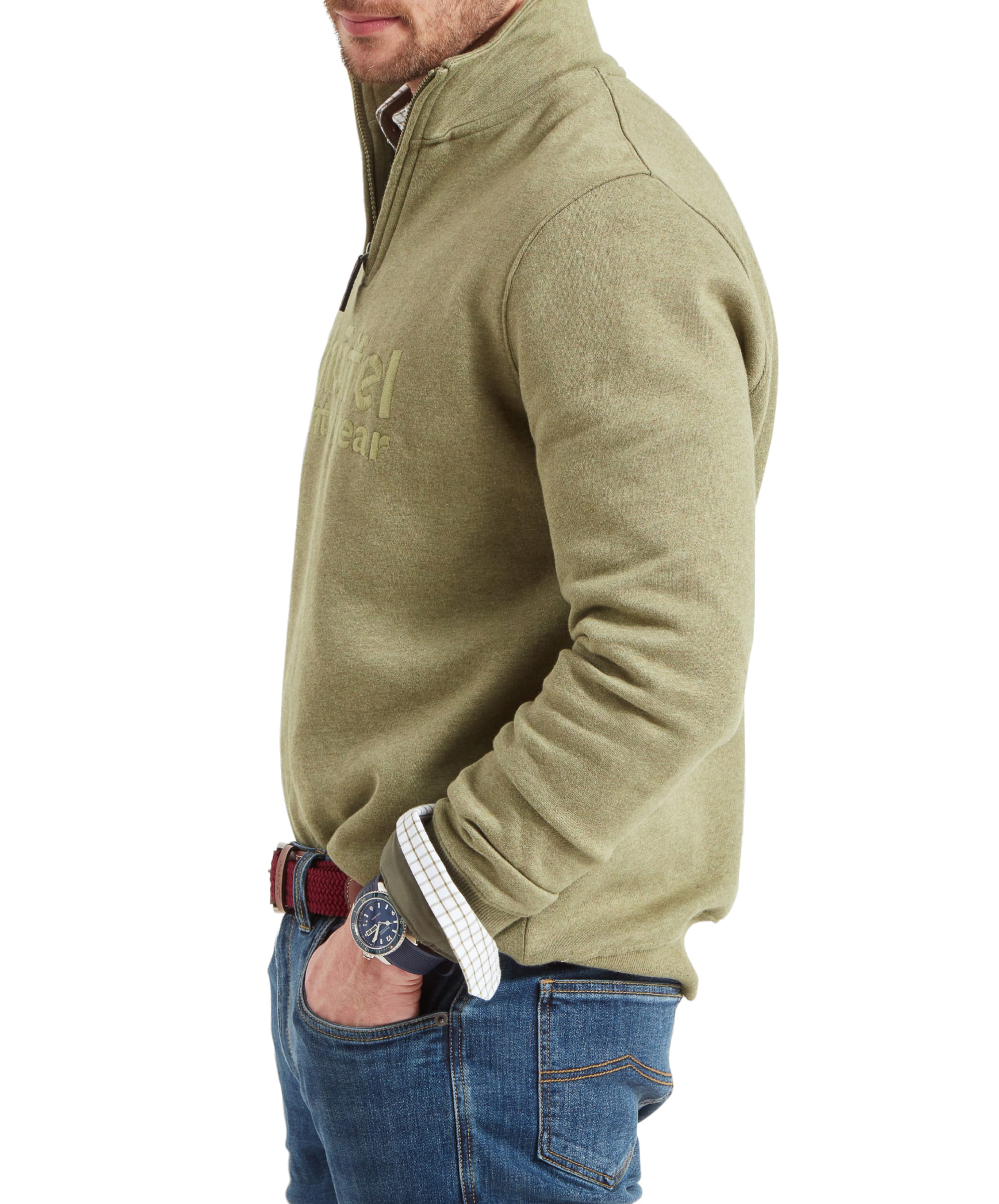 Side view of the man in the Schöffel Bude Sweatshirt for Men in Light Green, showing the detailed stitching on the sleeve.