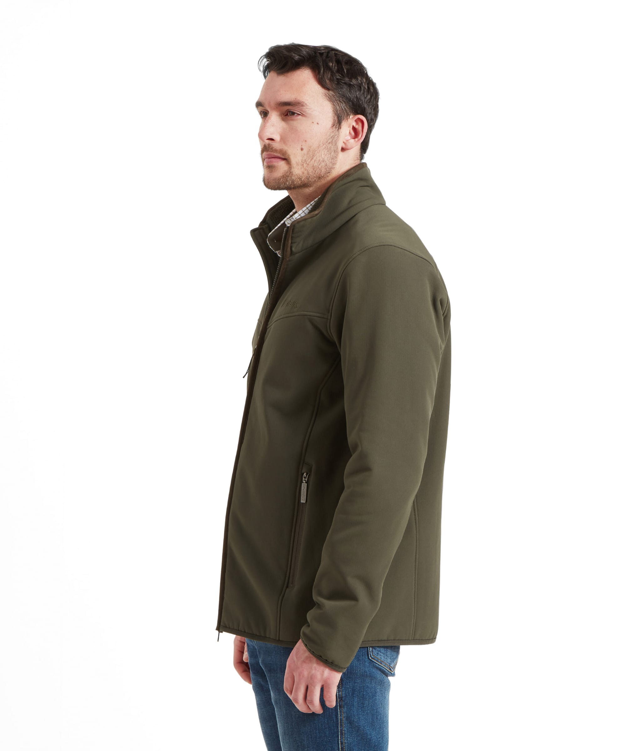 Side view of a man wearing the Schöffel Men's Burrough Jacket in Green, showcasing the fit and design.