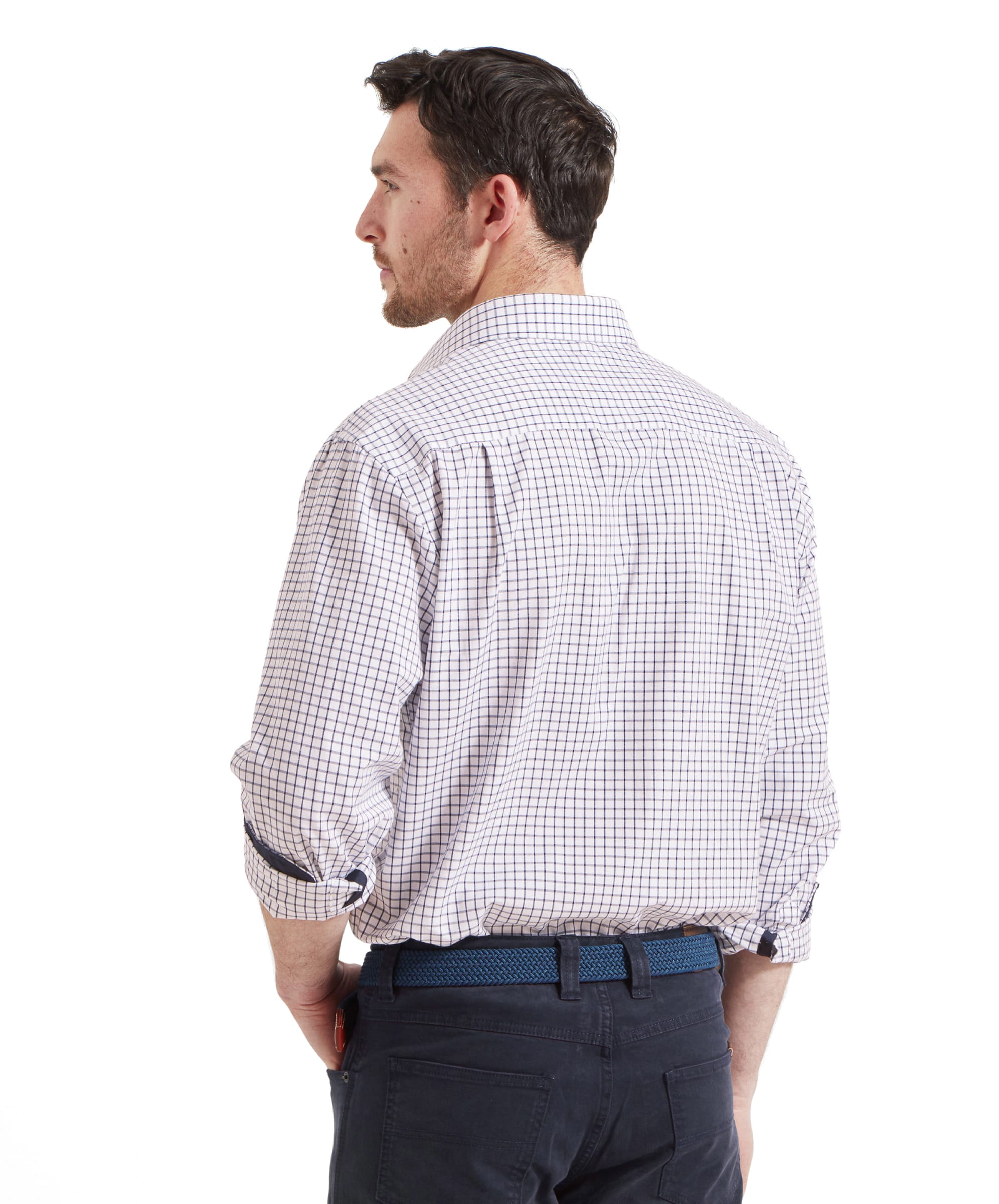 Rear view of the model wearing the Schöffel Cambridge Classic Shirt for Men in Navy, showcasing the back design with dark trousers.