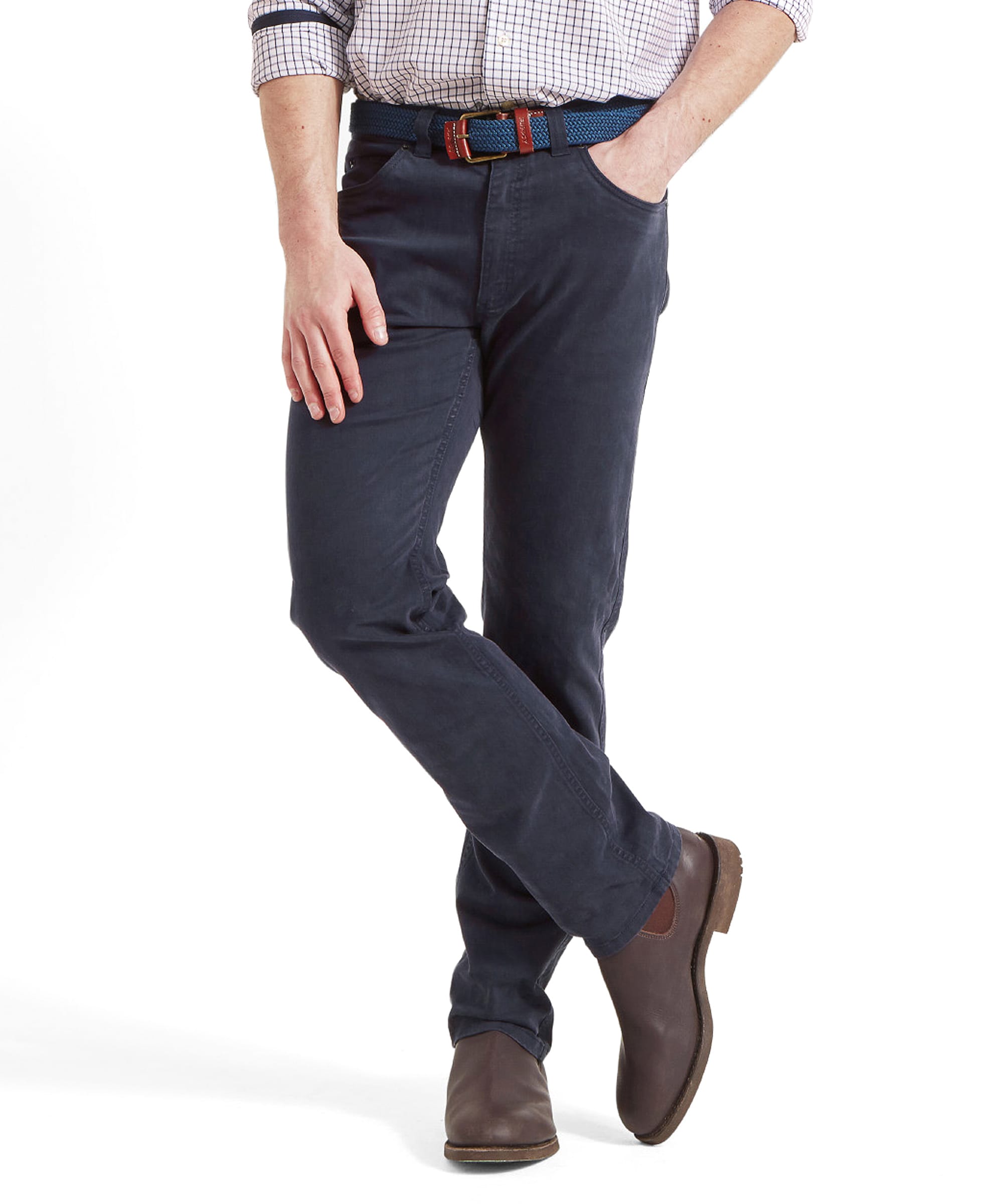 Model wearing the Schöffel Canterbury 5 Pocket Jean for Men in Navy, showing the front pockets with hands in pockets.