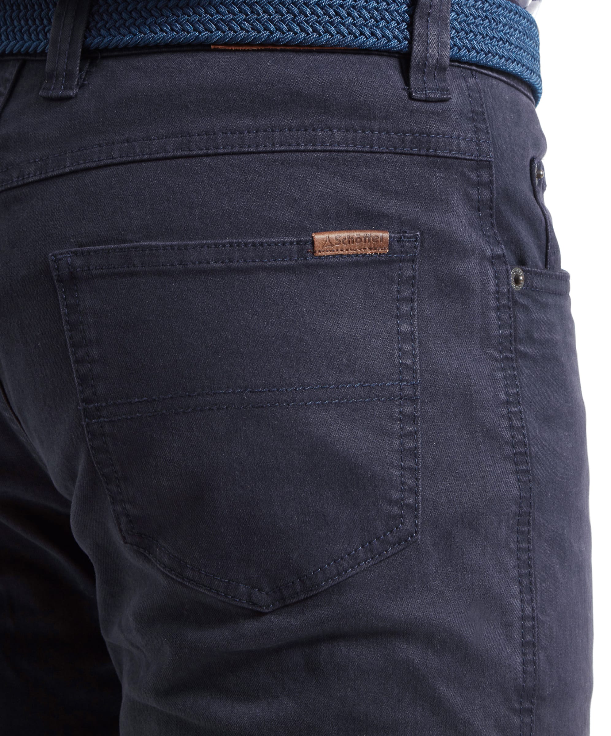 Close-up of the back pocket of the Schöffel Canterbury 5 Pocket Jean for Men in Navy, showing the Schöffel logo and pocket details.