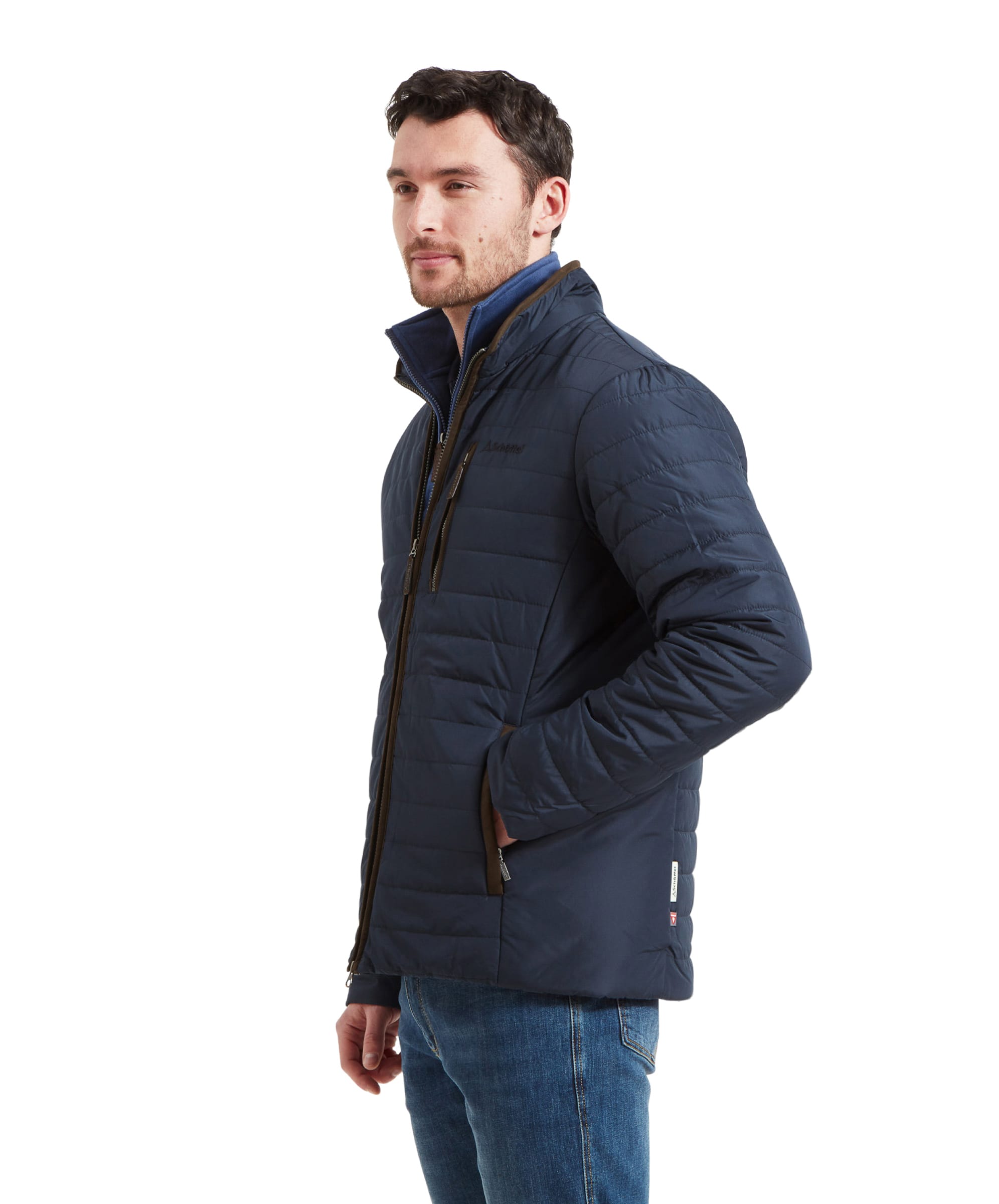 Side profile of the model showcasing the Schöffel Carron Jacket for Men in Navy, highlighting the fit and style of the jacket.