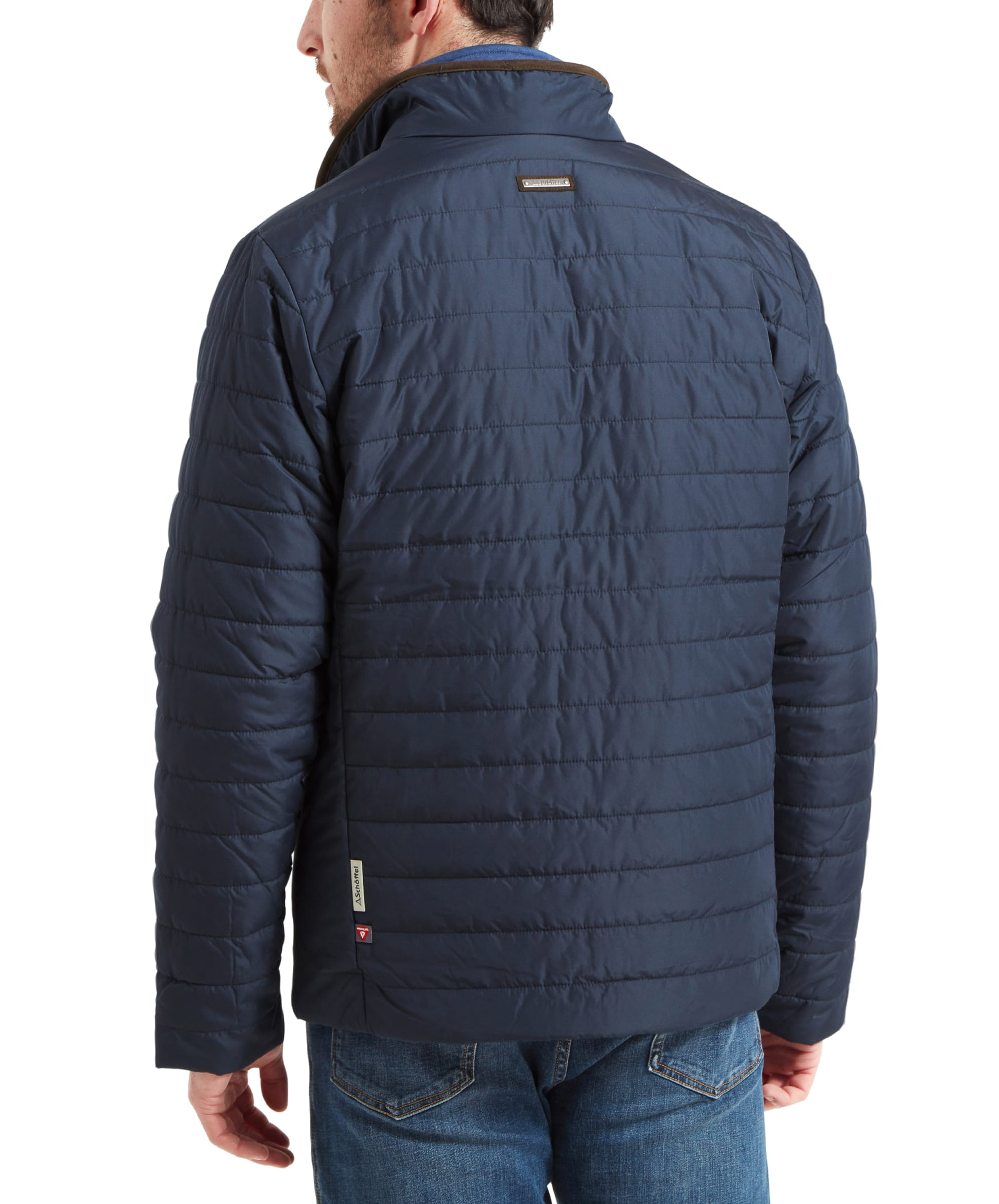 Back view of the Schöffel Carron Jacket for Men in Navy, emphasizing the quilted design and overall structure of the jacket.