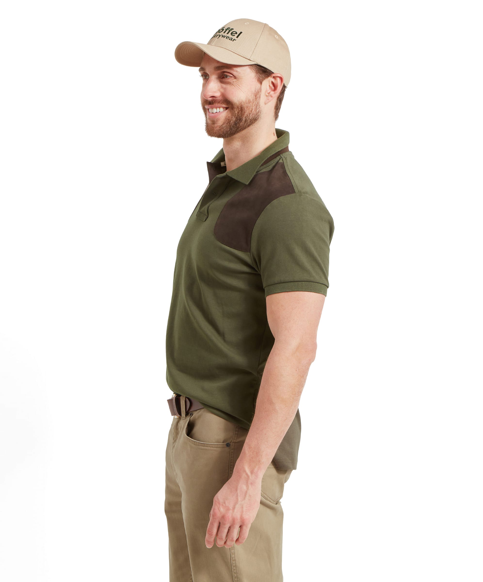 A side view of the Schöffel Cordoba Polo Shirt for Men in Green, showcasing the dark brown shoulder patches.