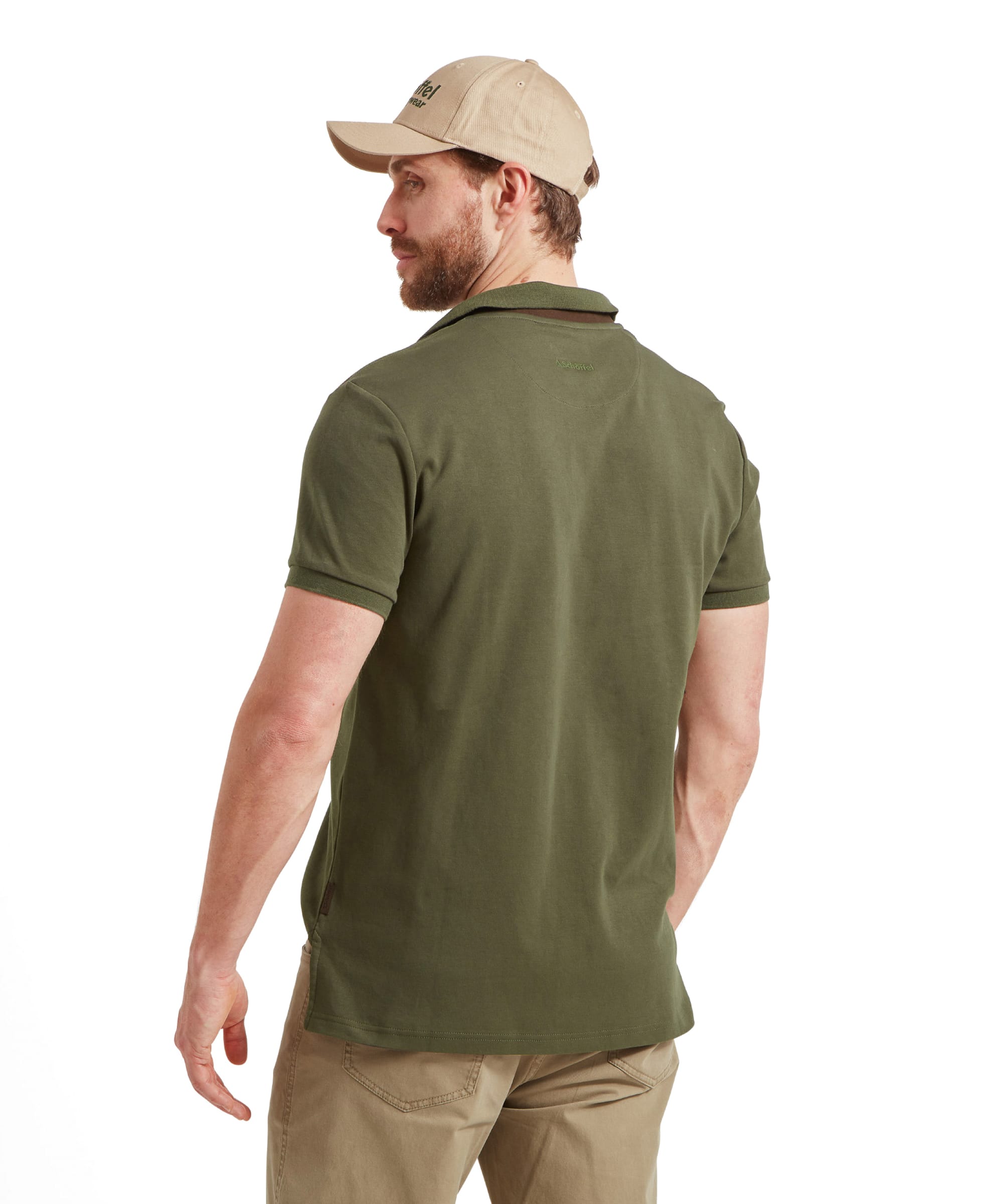 A back view of the Schöffel Cordoba Polo Shirt for Men in Green, highlighting its tailored fit.