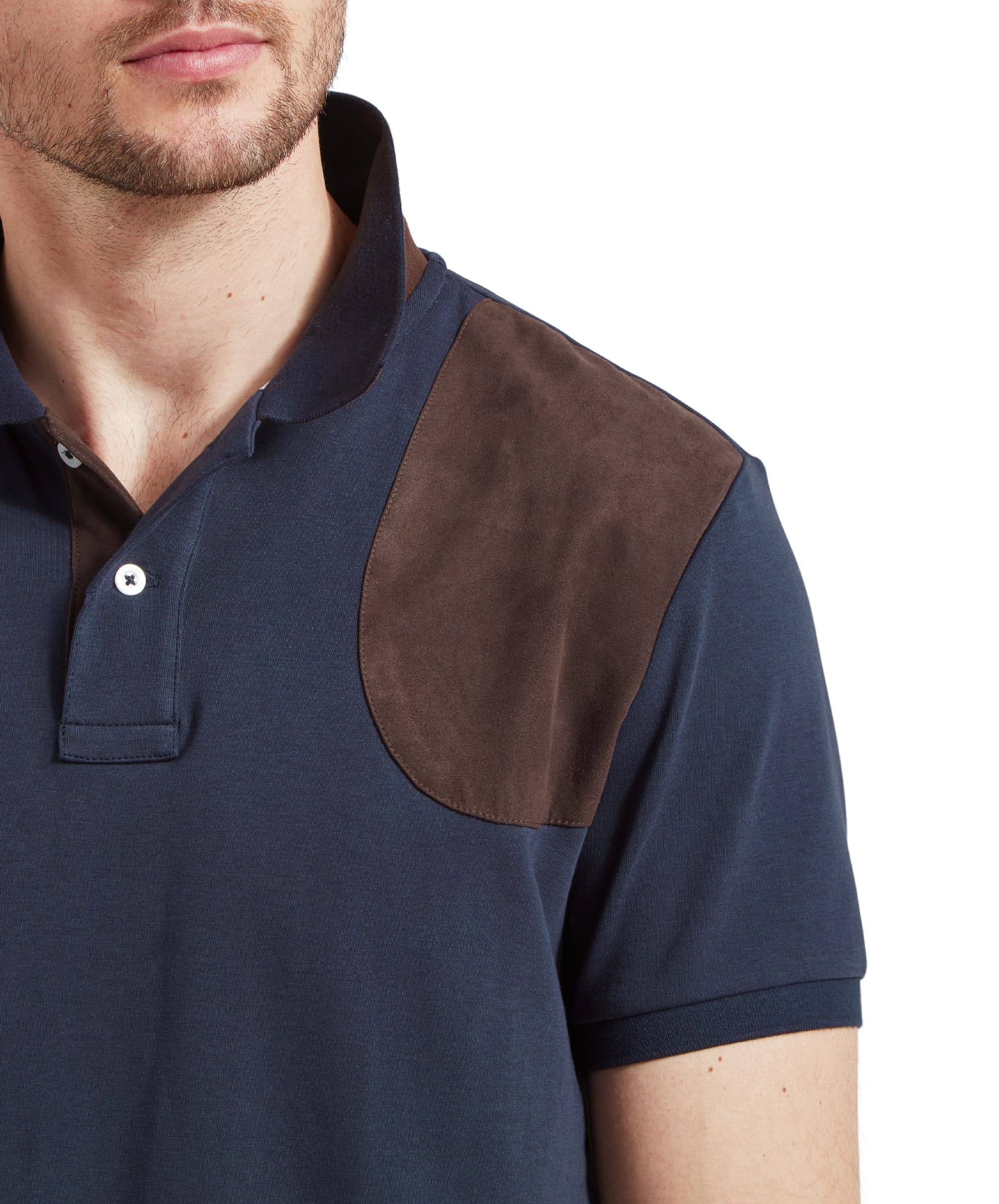 Close-up of the shoulder patch details of the Schöffel Cordoba Polo Shirt for Men in Navy.