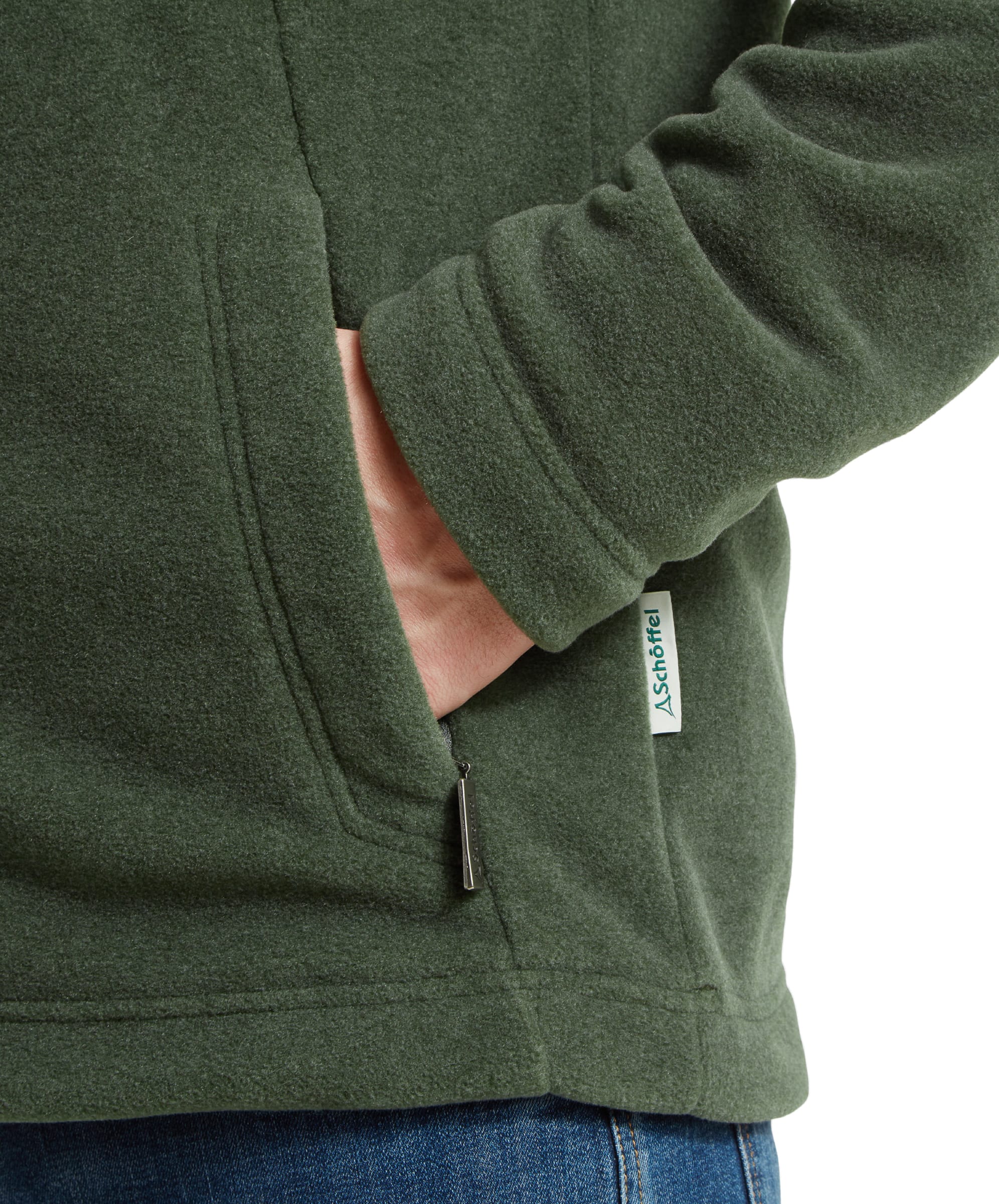 Close-up of the model's hand in the Schöffel Cottesmore Fleece Jacket for Men in Green's pocket, displaying the pocket design.