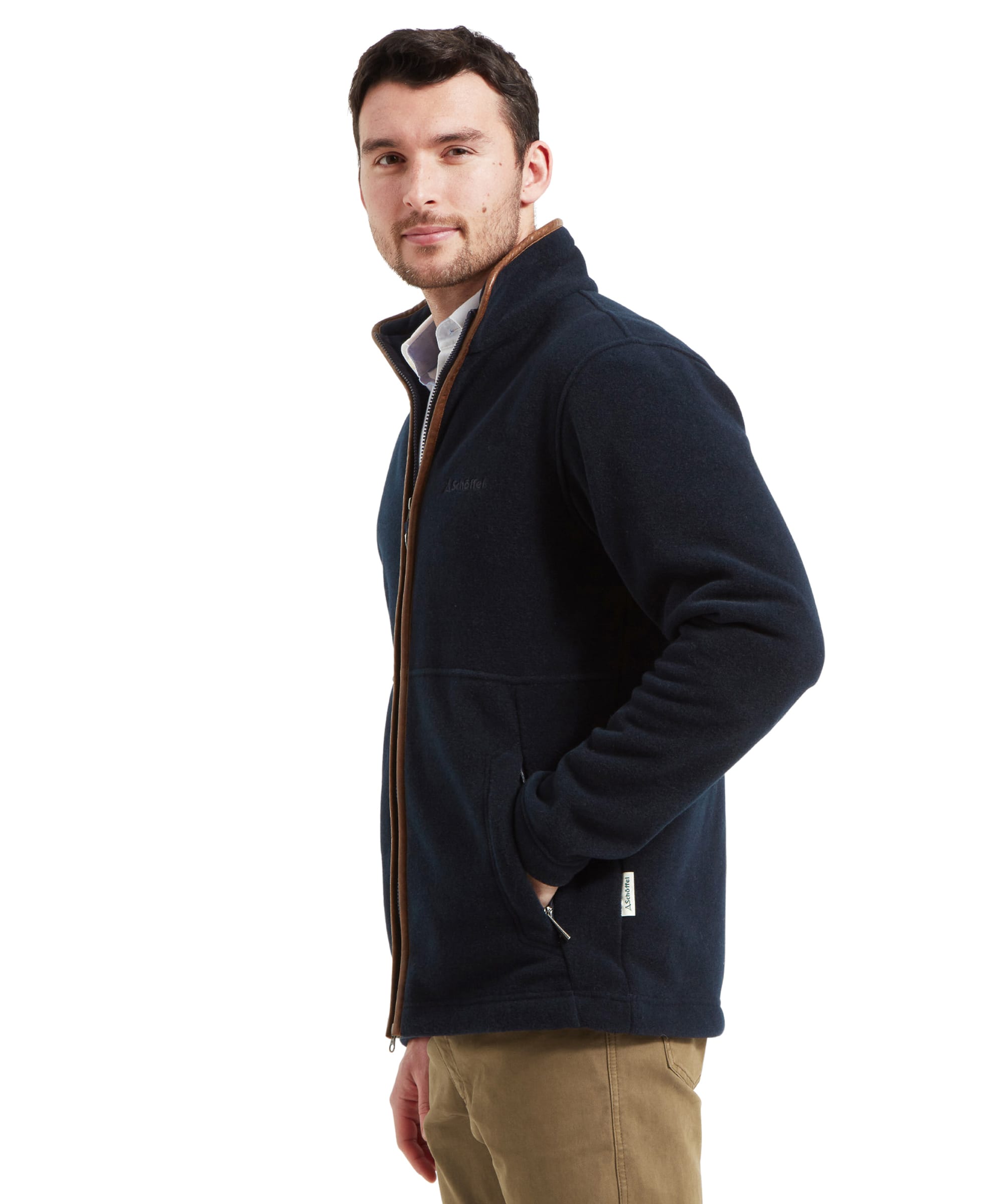 Side view of a man wearing Schöffel Cottesmore Fleece Jacket for Men in Navy, highlighting the zipper detail.