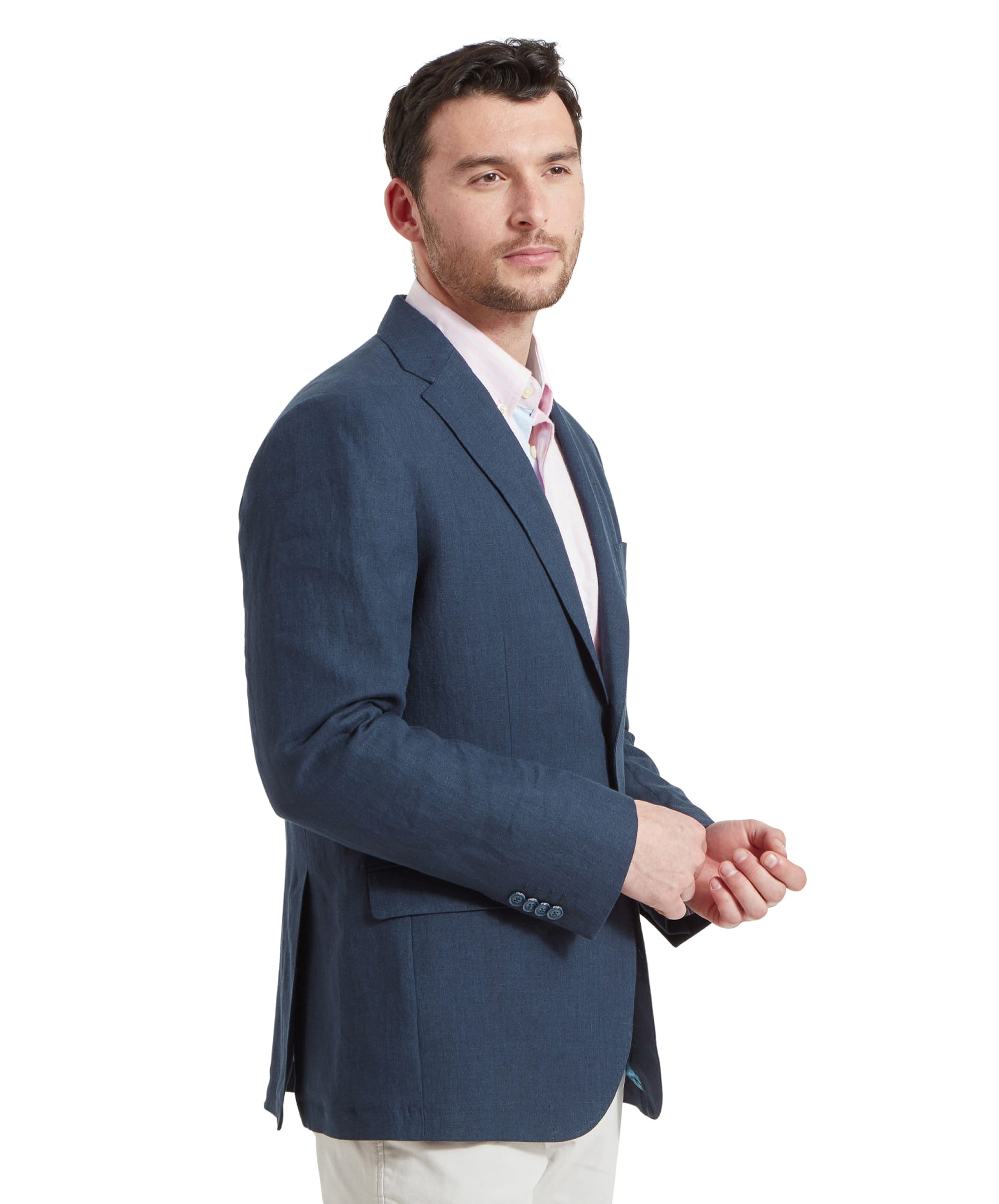 Side view of a man in the Schöffel Cowes Linen Jacket for Men in Navy, highlighting the jacket's fit.