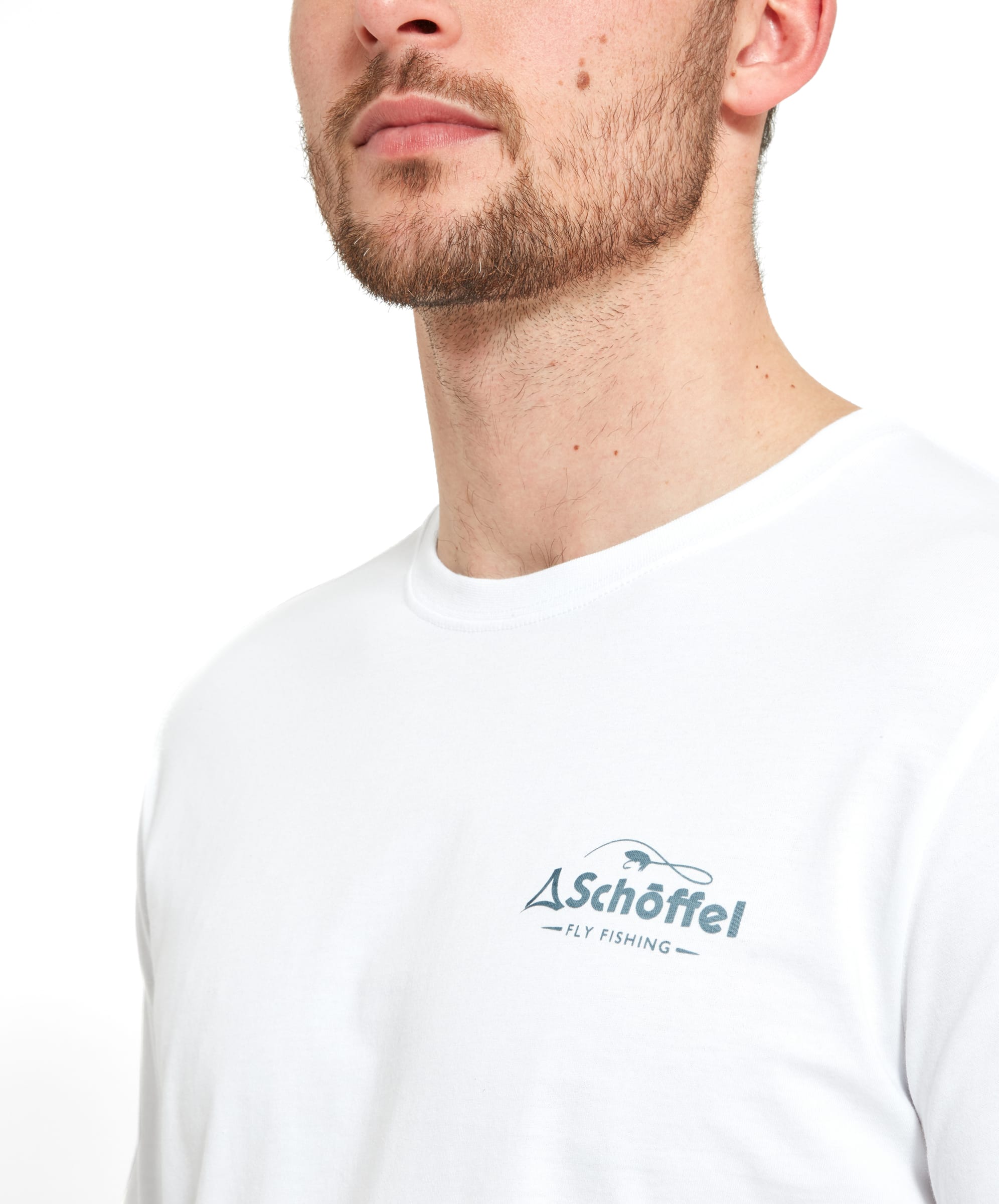 Close-up of the Schöffel Esk T-Shirt for Men in White, focusing on the Schöffel Fly Fishing logo on the left chest.