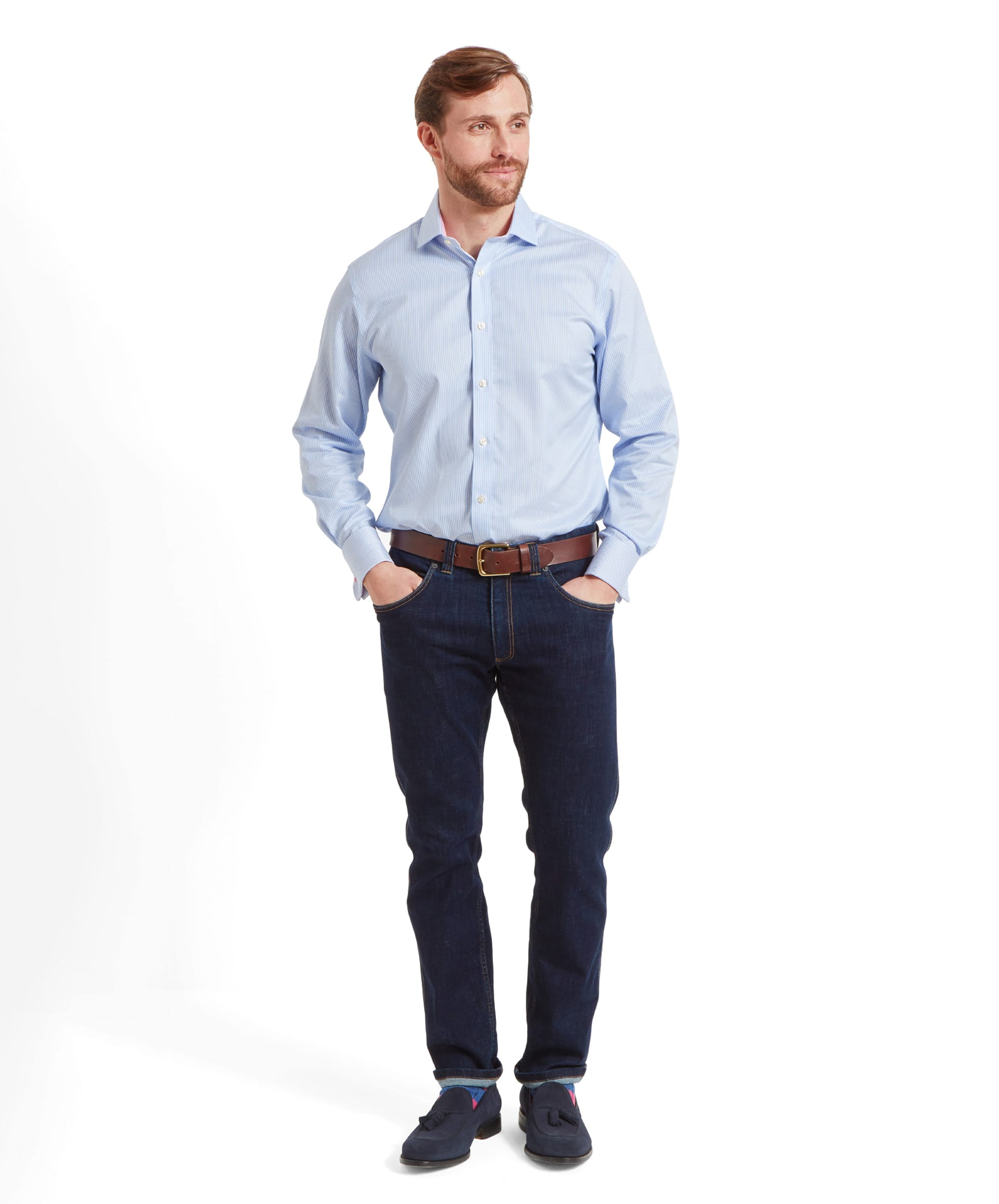 A close-up of a man wearing a Schöffel Greenwich Tailored Shirt for Men in Blue Stripe, highlighting the collar and the top part of the shirt with the pink lining on the inner collar.