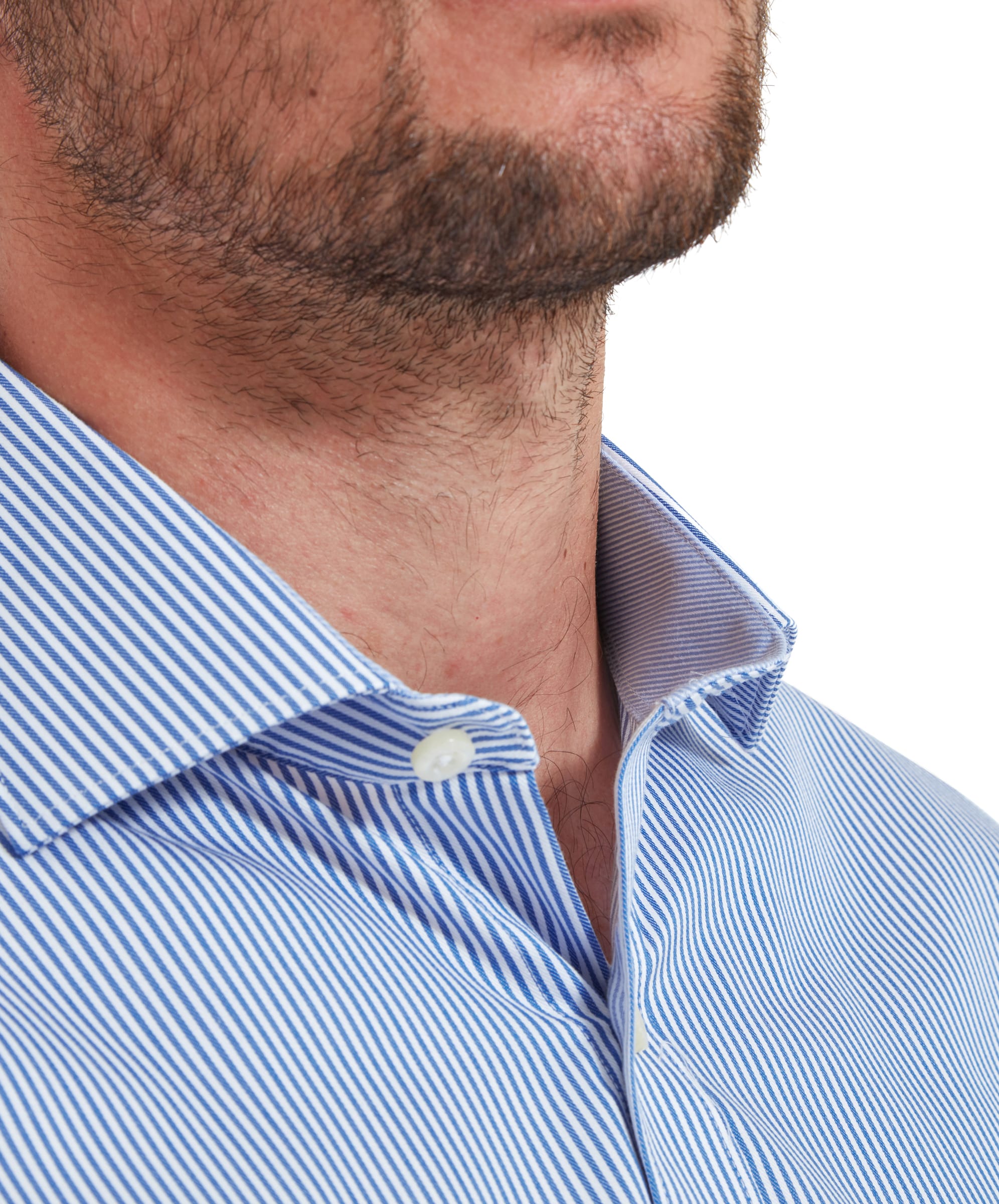 A close-up of the Schöffel Greenwich Tailored Shirt for Men in Navy Stripe, highlighting the collar and the top buttons. The collar is crisp and well-structured, adding to the shirt's refined appearance.