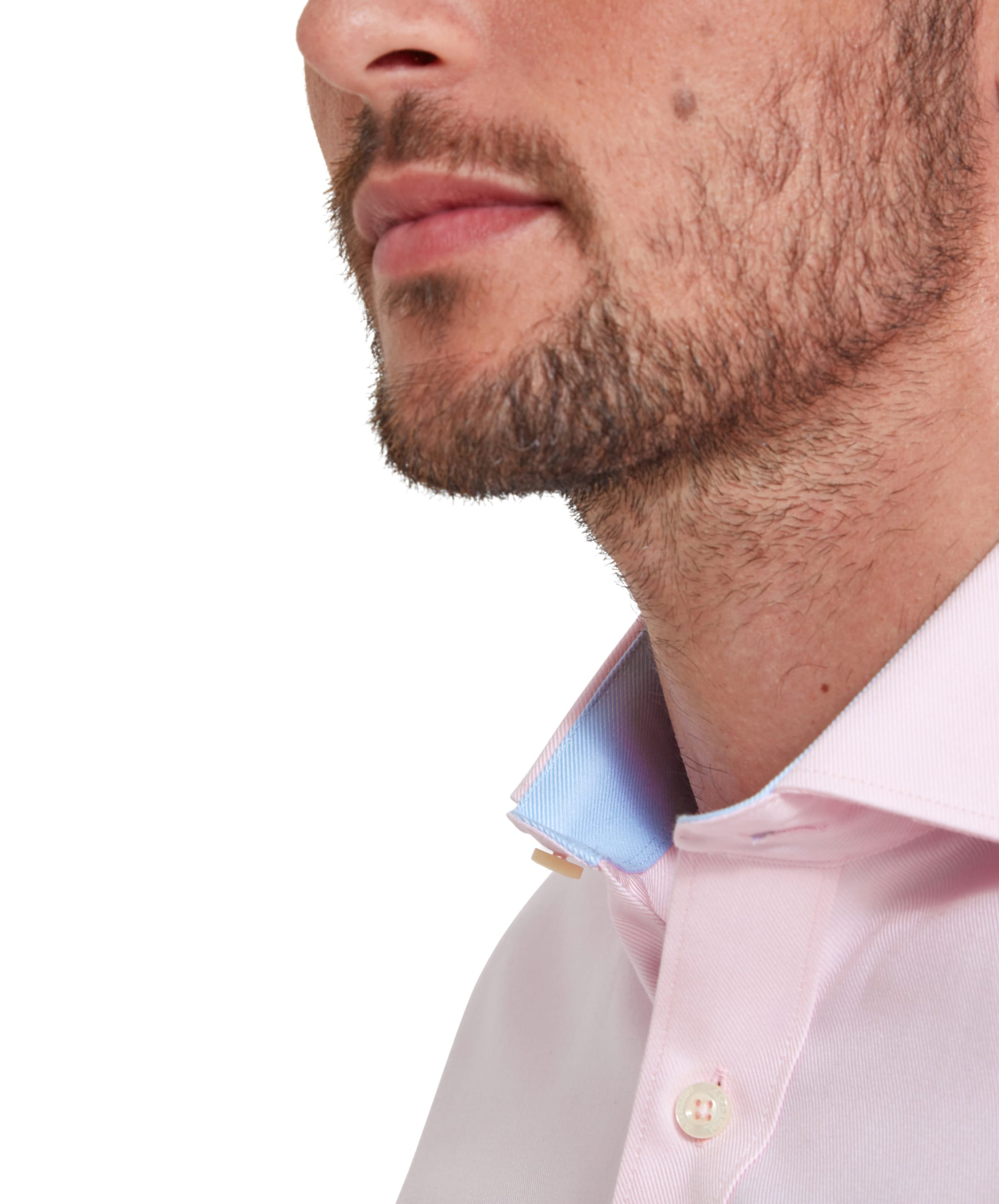 A close-up of the collar, showing the contrasting light blue inner lining of the Schöffel Greenwich Tailored Shirt for Men in Pink.