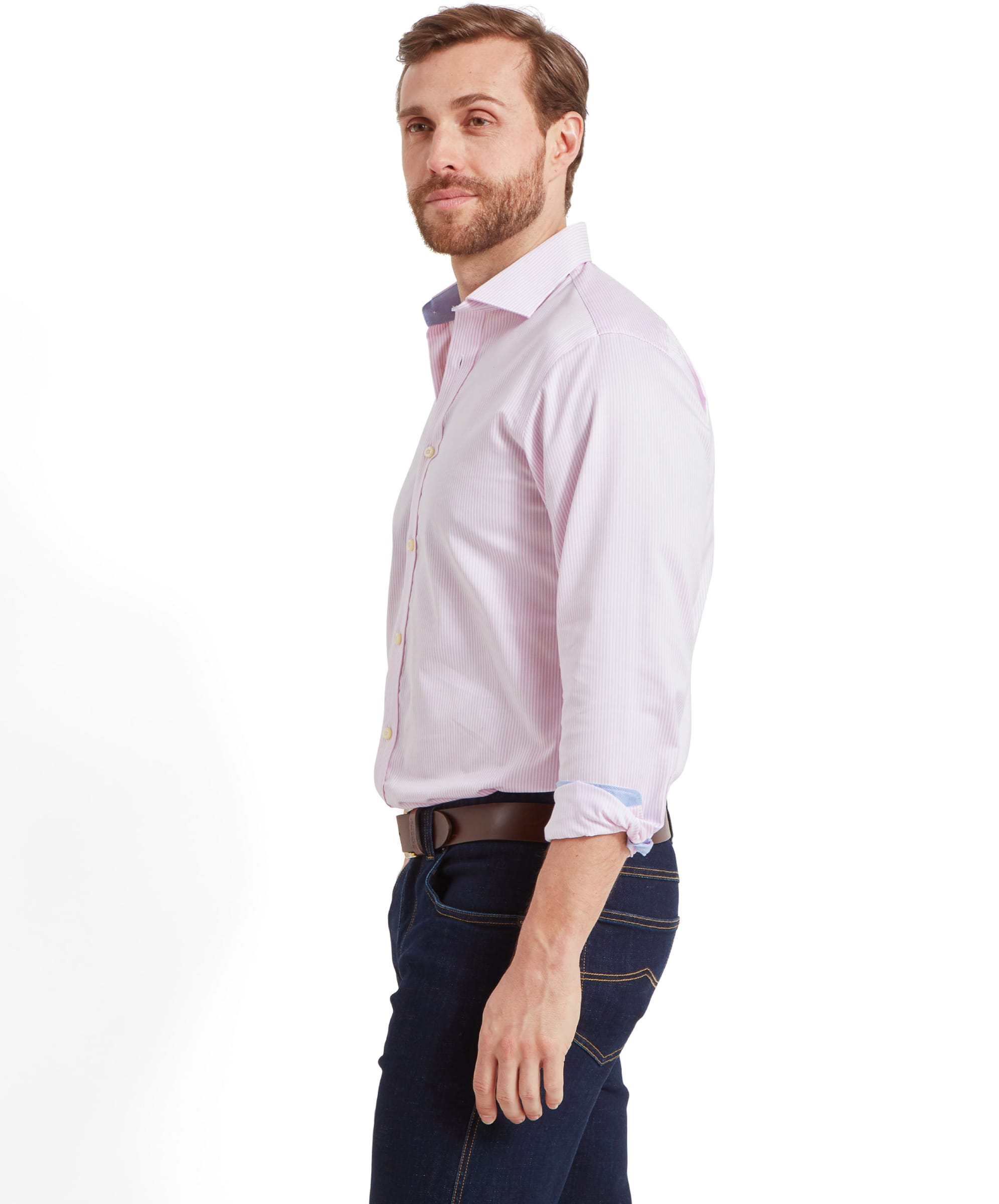 Side view of a man in the Schöffel Greenwich Tailored Shirt for Men in Pink Stripe.