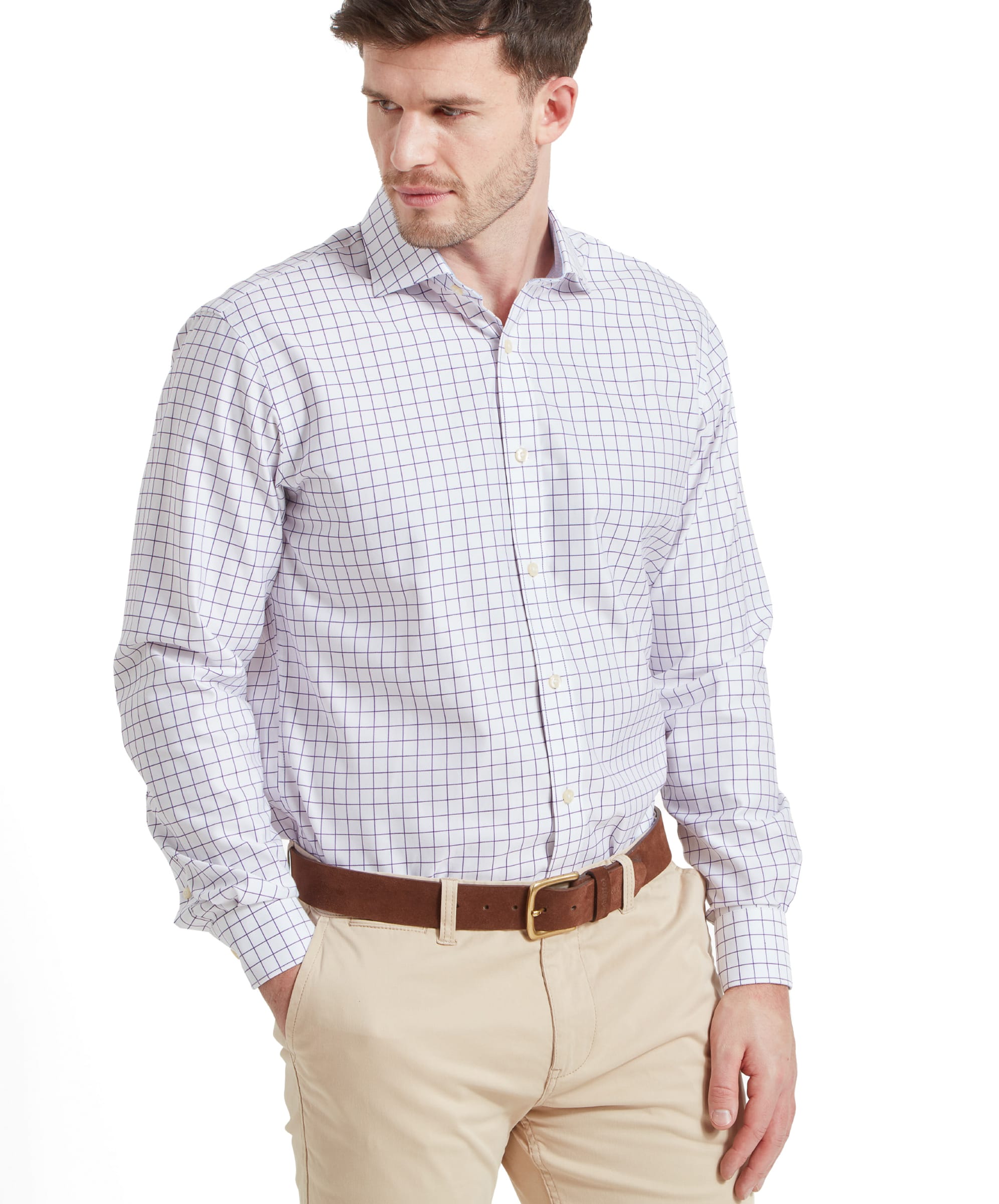 Man wearing a Schöffel Greenwich Tailored Shirt for Men in Purple, with a casual pose, showing the shirt's pattern and fit.