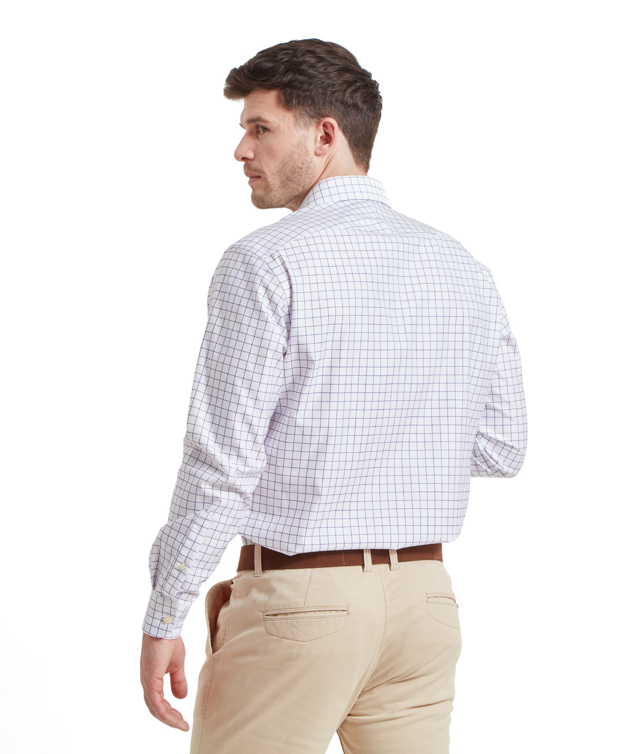 Back view of a man in the Schöffel Greenwich Tailored Shirt for Men in Purple, showing the shirt's back design and fit.