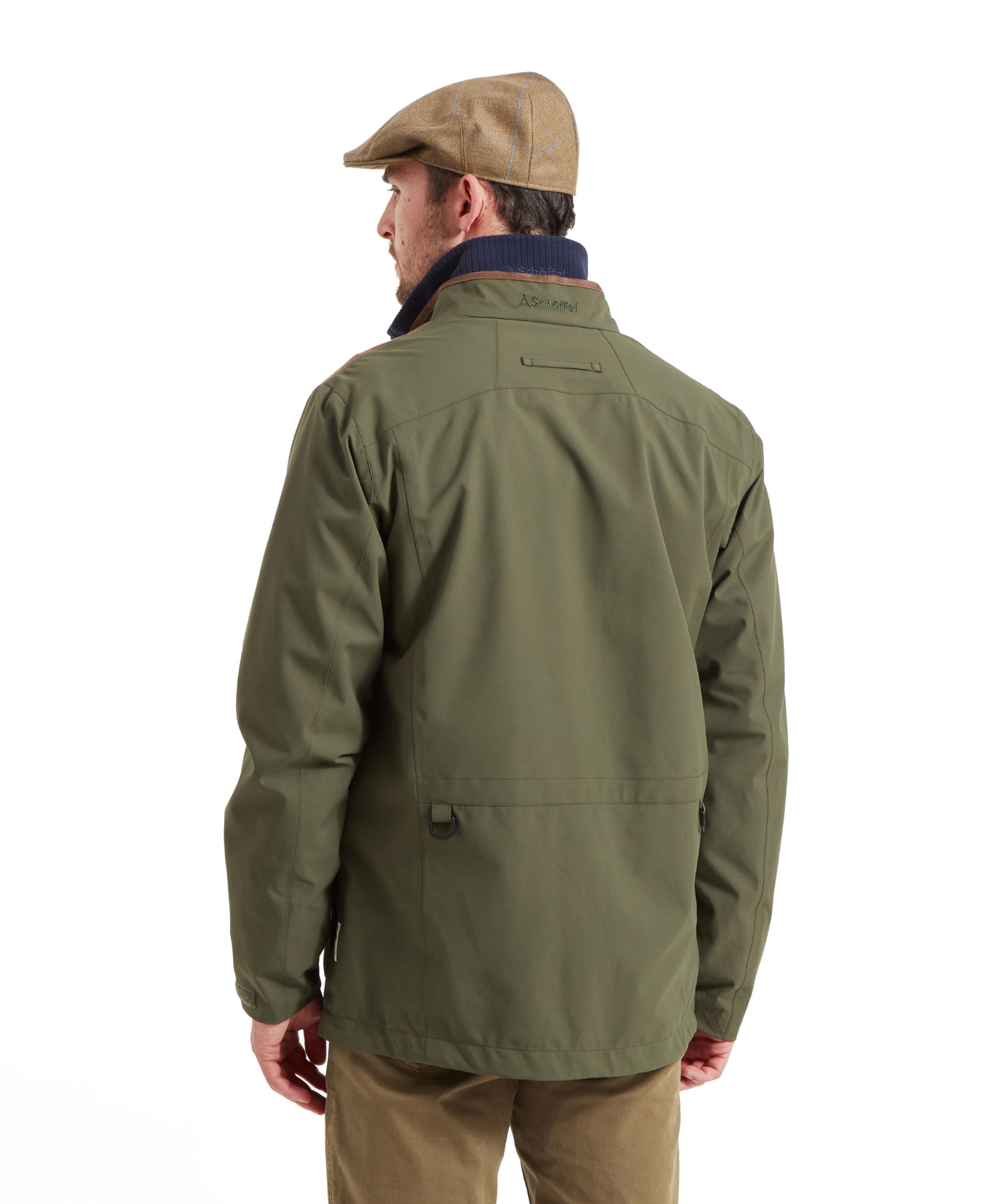 Back view of a man in the Schöffel Grimsthorpe Clay Shooting Jacket in Green, showcasing the jacket's design and back details.