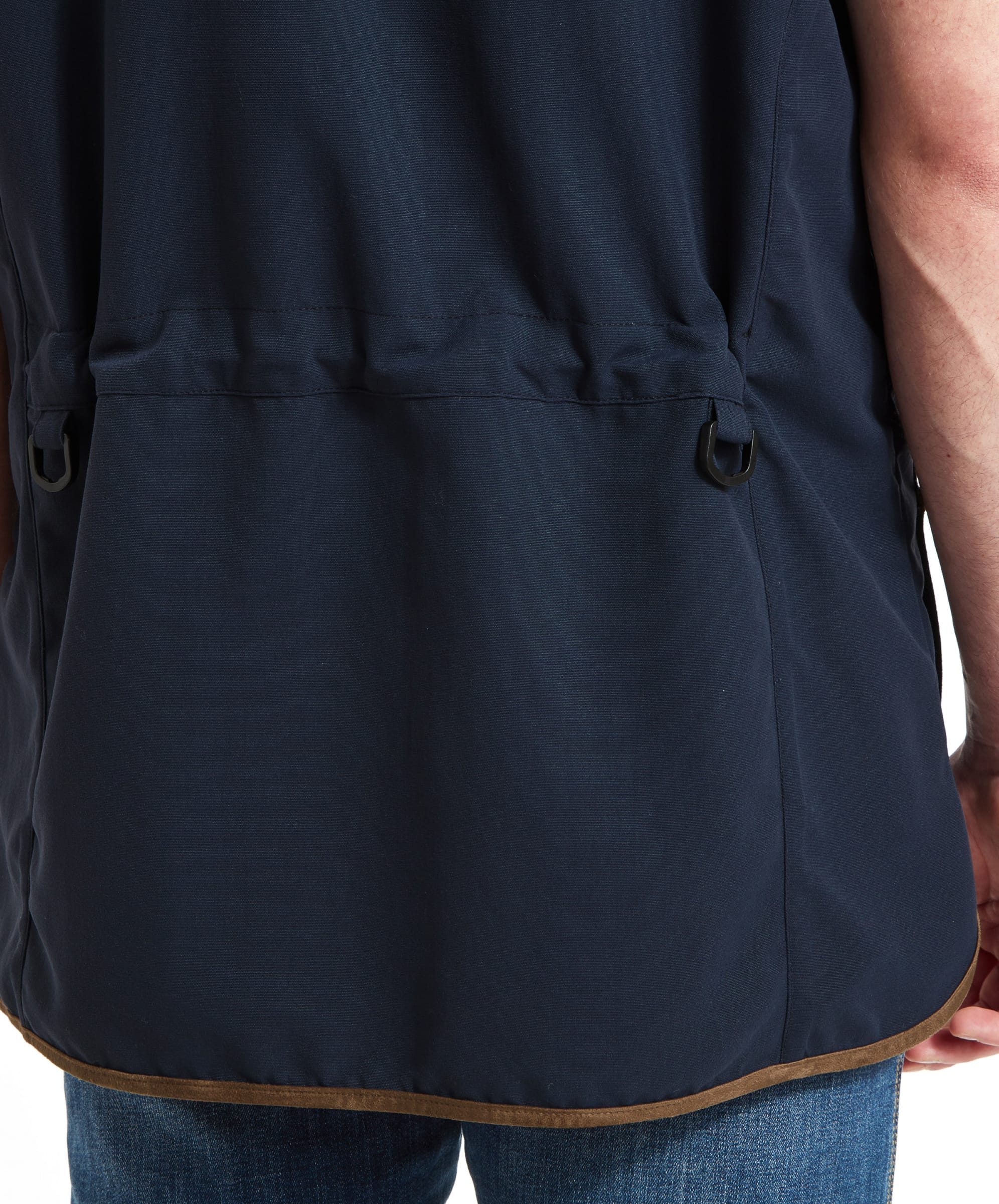 Close-up of the waist cinch of the Schöffel Grimsthorpe Clay Shooting Vest for Men in Blue, highlighting the adjustable strap.