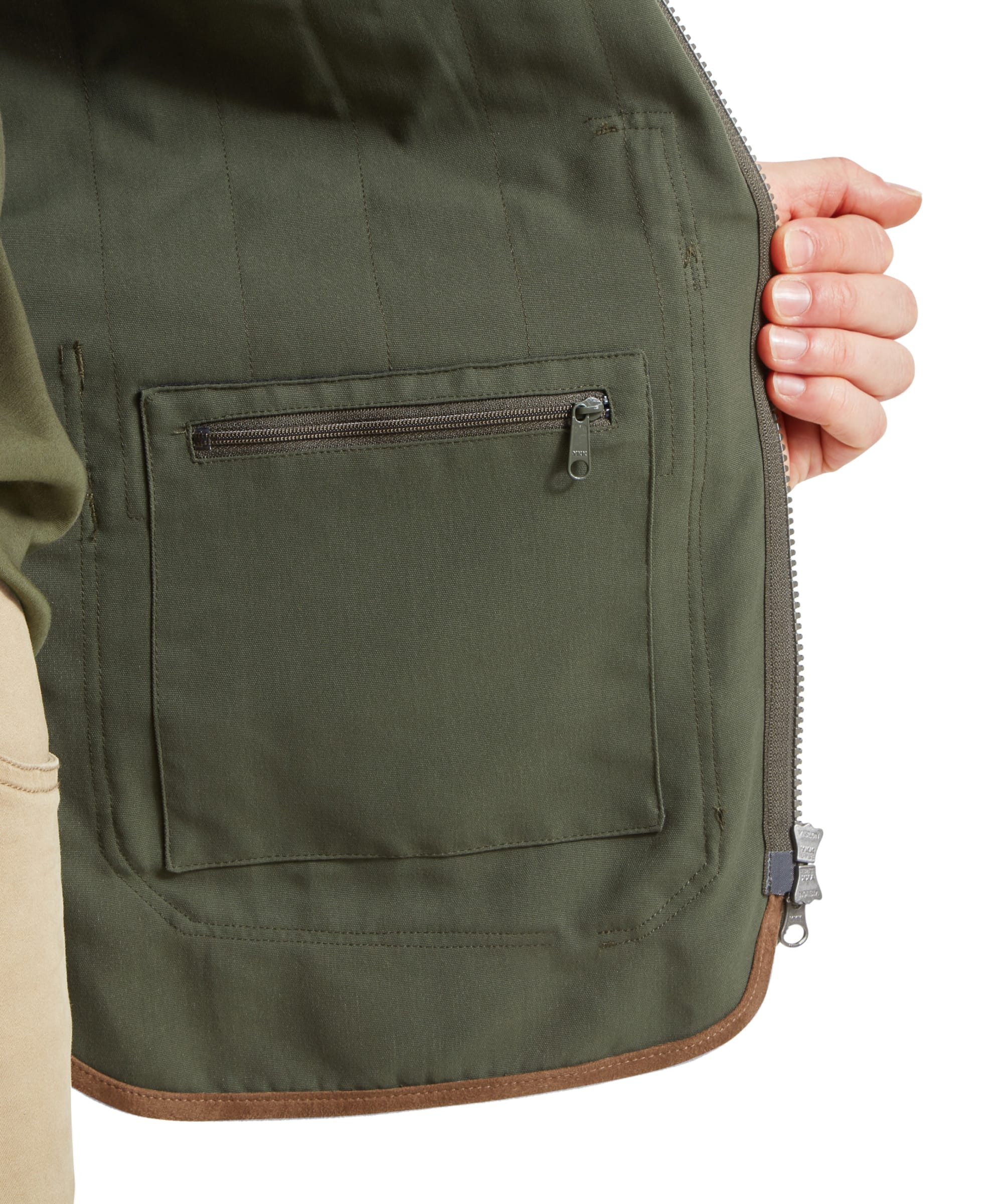 Detail view of the security pocket of the Schöffel Grimsthorpe Clay Shooting Vest for Men in Green, showcasing the zipper.