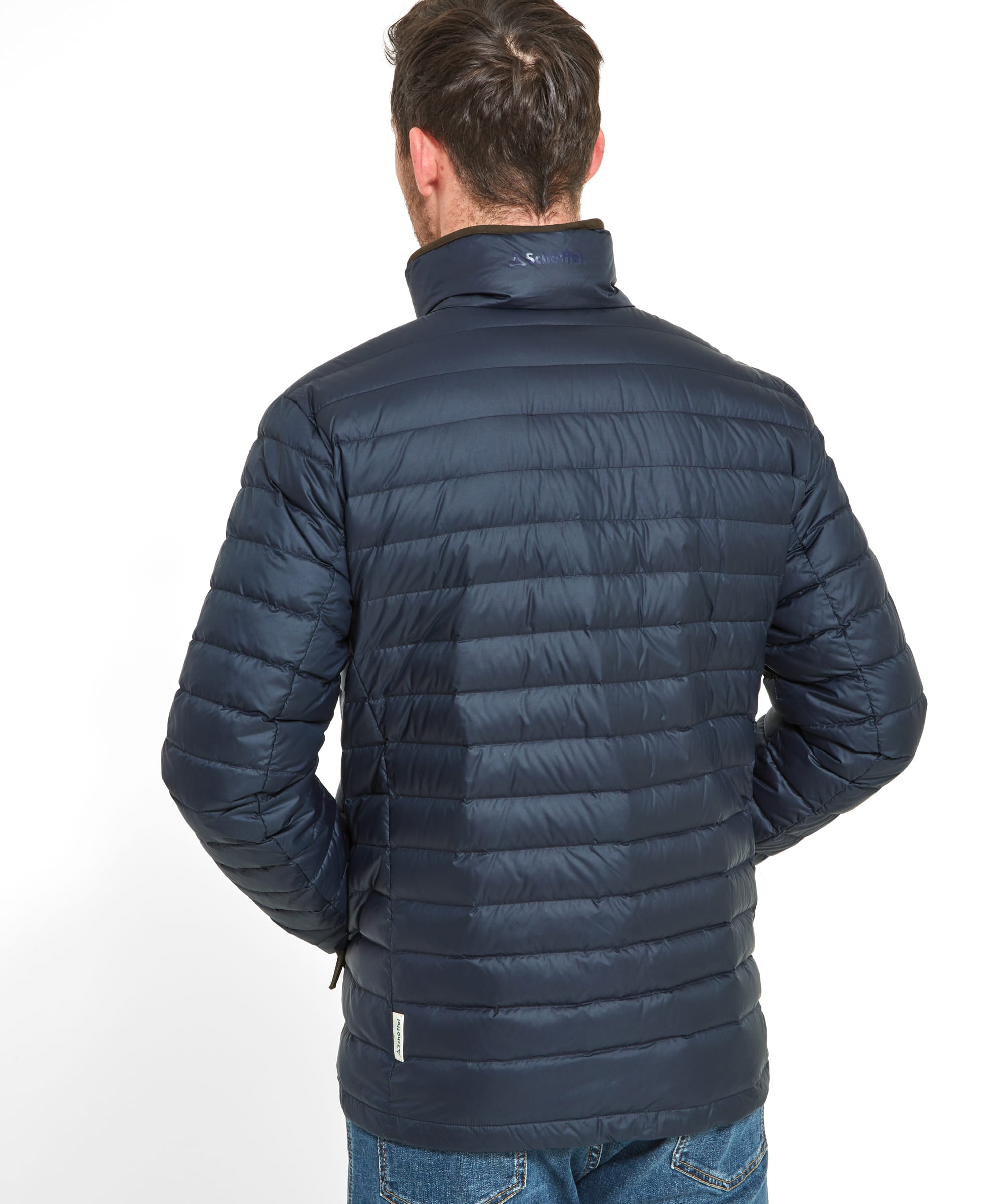 Back view of the Schöffel Hallaton Down Jacket for Men in Blue showing the ribbed detail on the back and the logo displayed on the back of the collar.