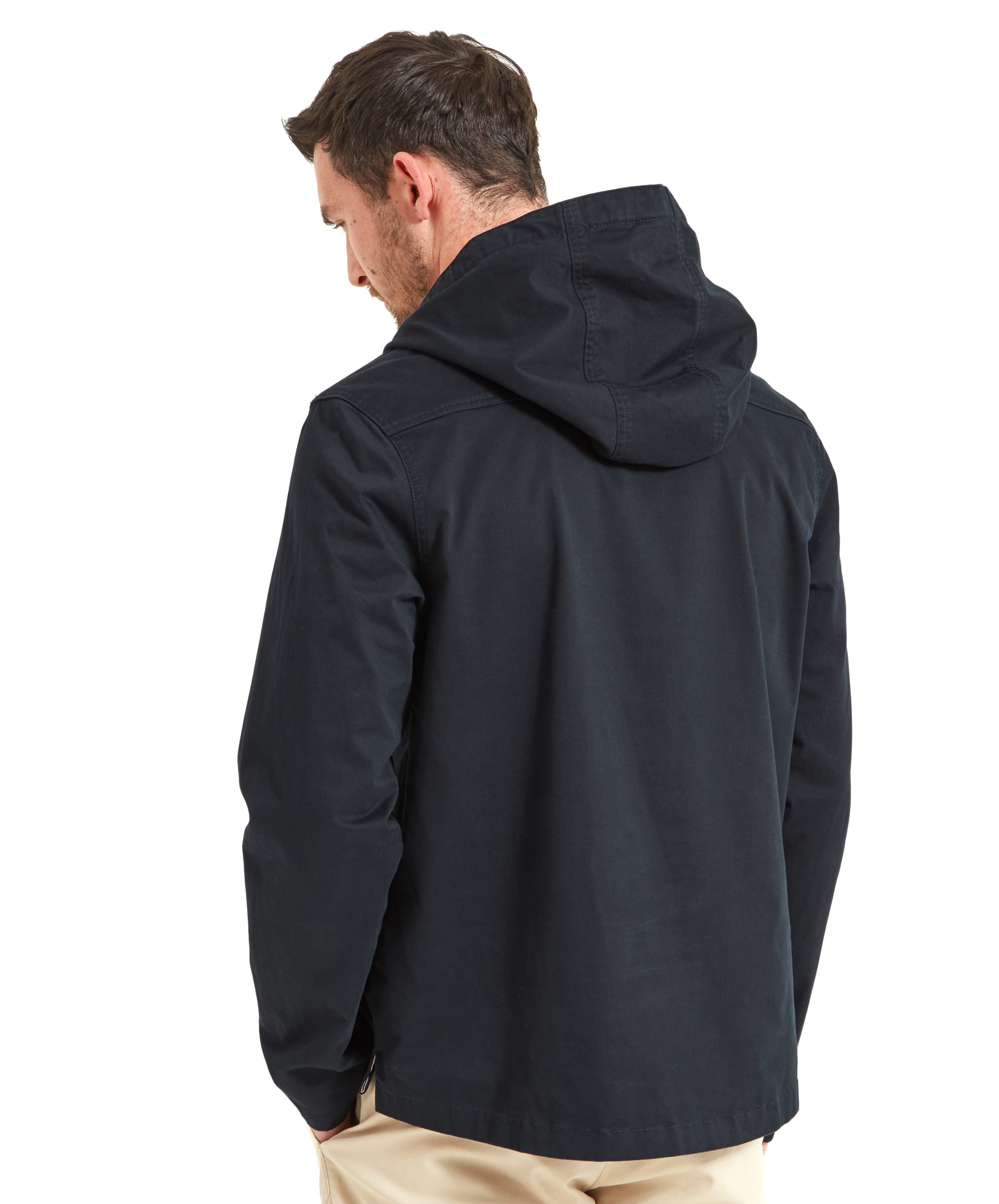 Back view of a man wearing the Schöffel Harbour Smock for Men in Navy, highlighting the jacket detail and the hood.