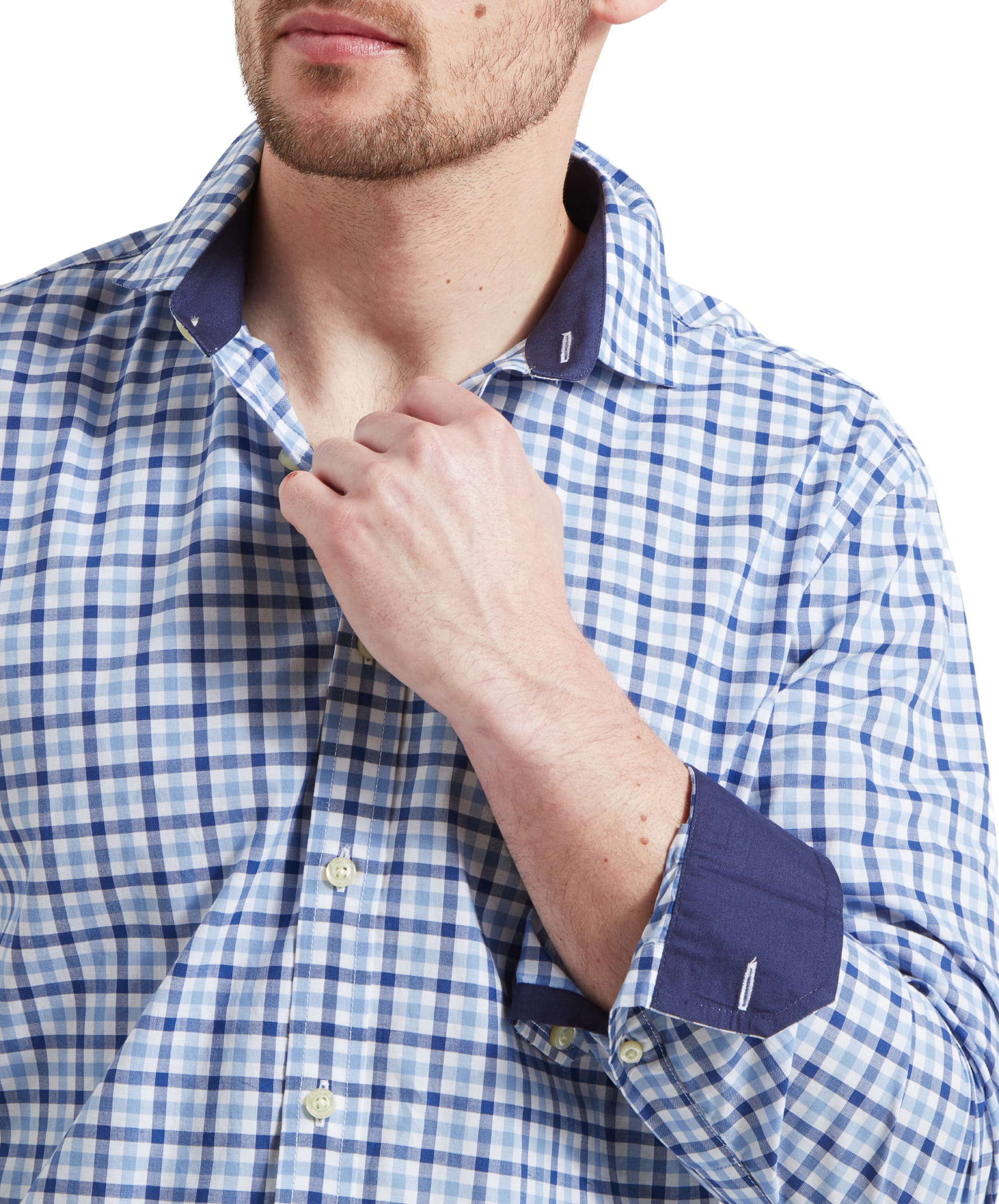 Close-up of the Schöffel Hebden Tailored Shirt for Men in Blue Navy collar and cuff area. The man wears the cuff folded over at the wrist highlighting the navy blue interior which matches the collar interior also.