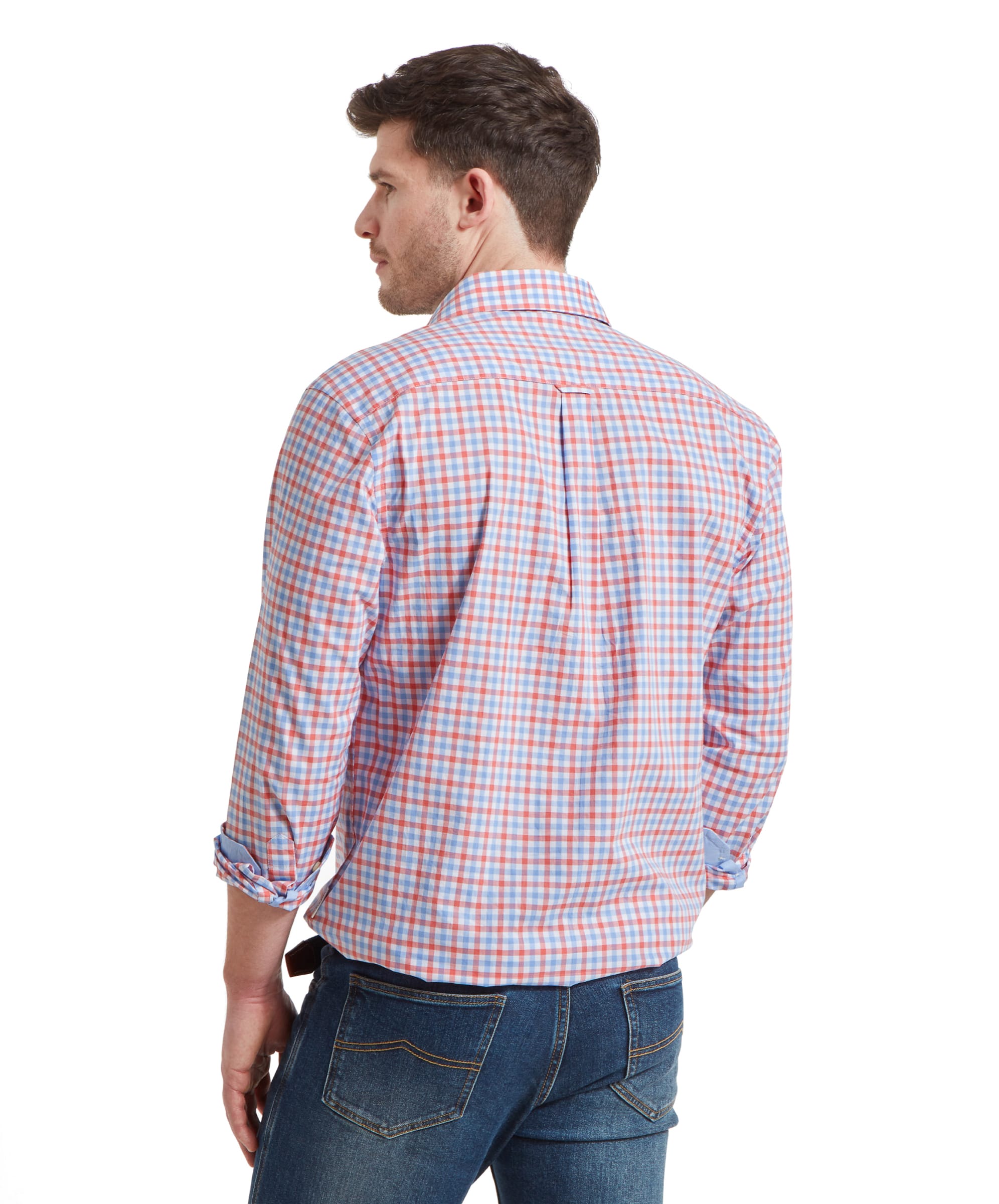 Back view of a man in the Schöffel Hebden Tailored Shirt for Men in Coral and Blue showing the fit and structure of the shirt.