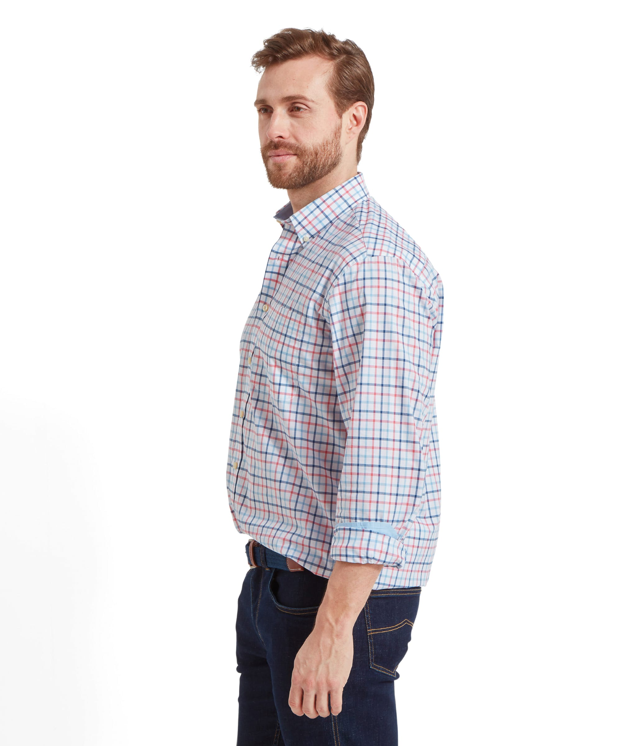 Side view of the Schöffel Holkham Classic Shirt for Men in Navy and Red highlighting the rolled cuff of the shirt. The colours within the checkered fabric are light blue, blue and red.