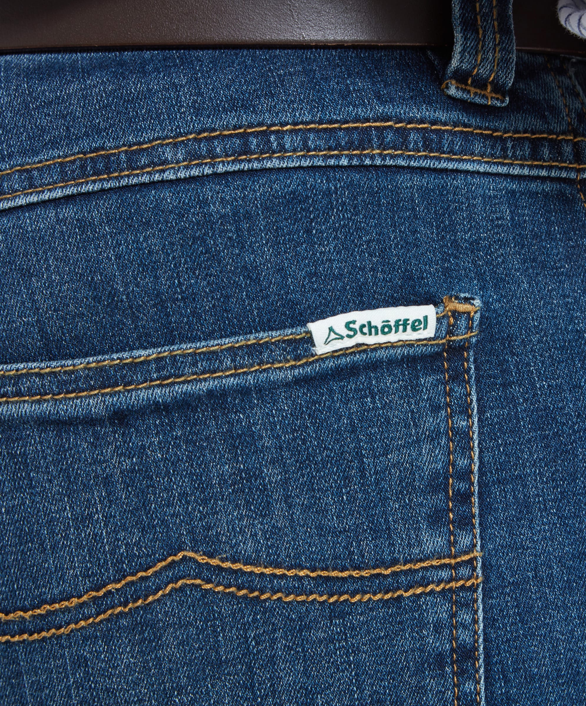 Close-up of the back pocket on the Schöffel James Jean for Men in Blue highlighting the branded logo tag.