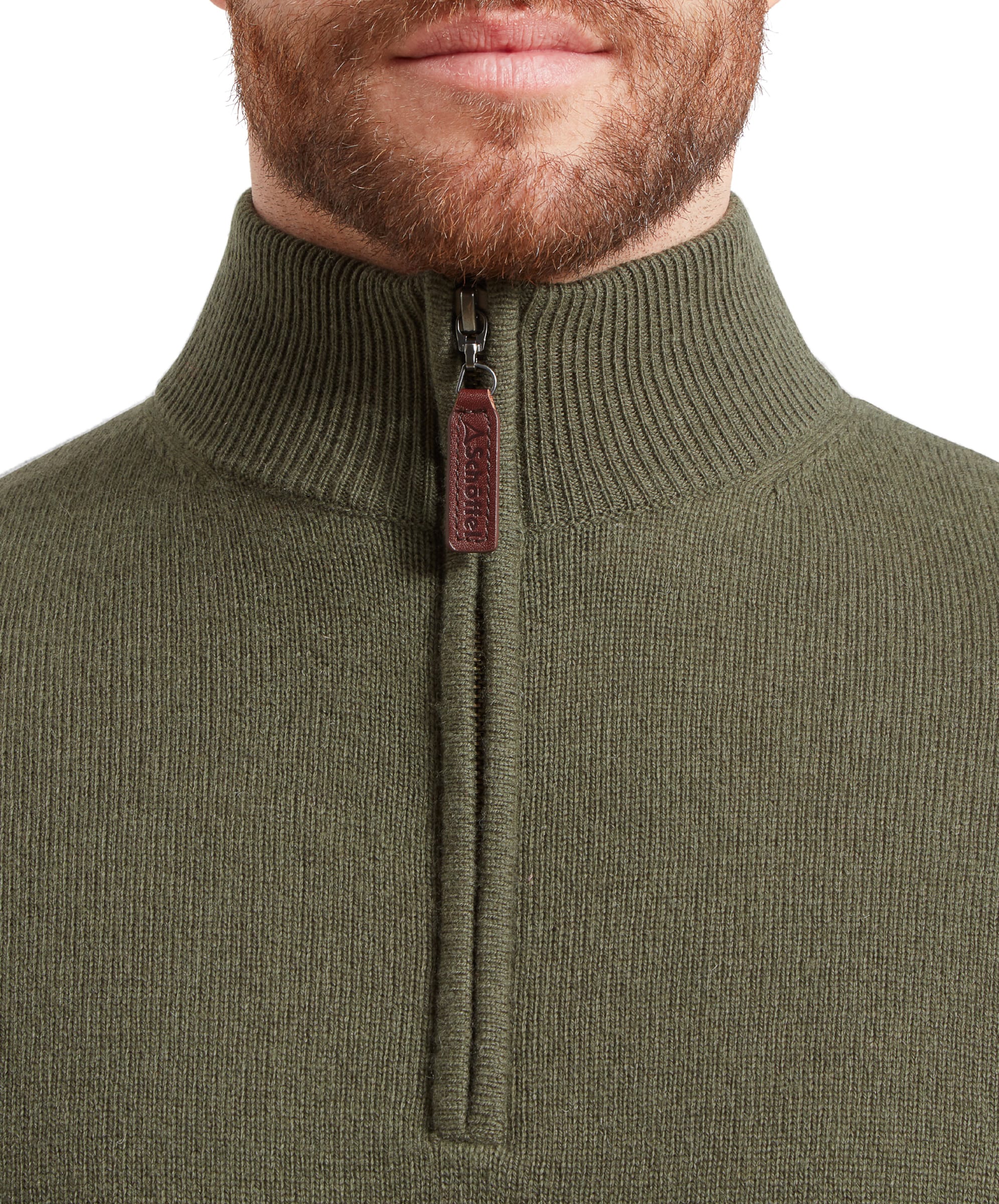 Close-up of the zip area of the Schöffel Lambswool 1/4 Zip for Men in Green highlighting the faux leather pull.