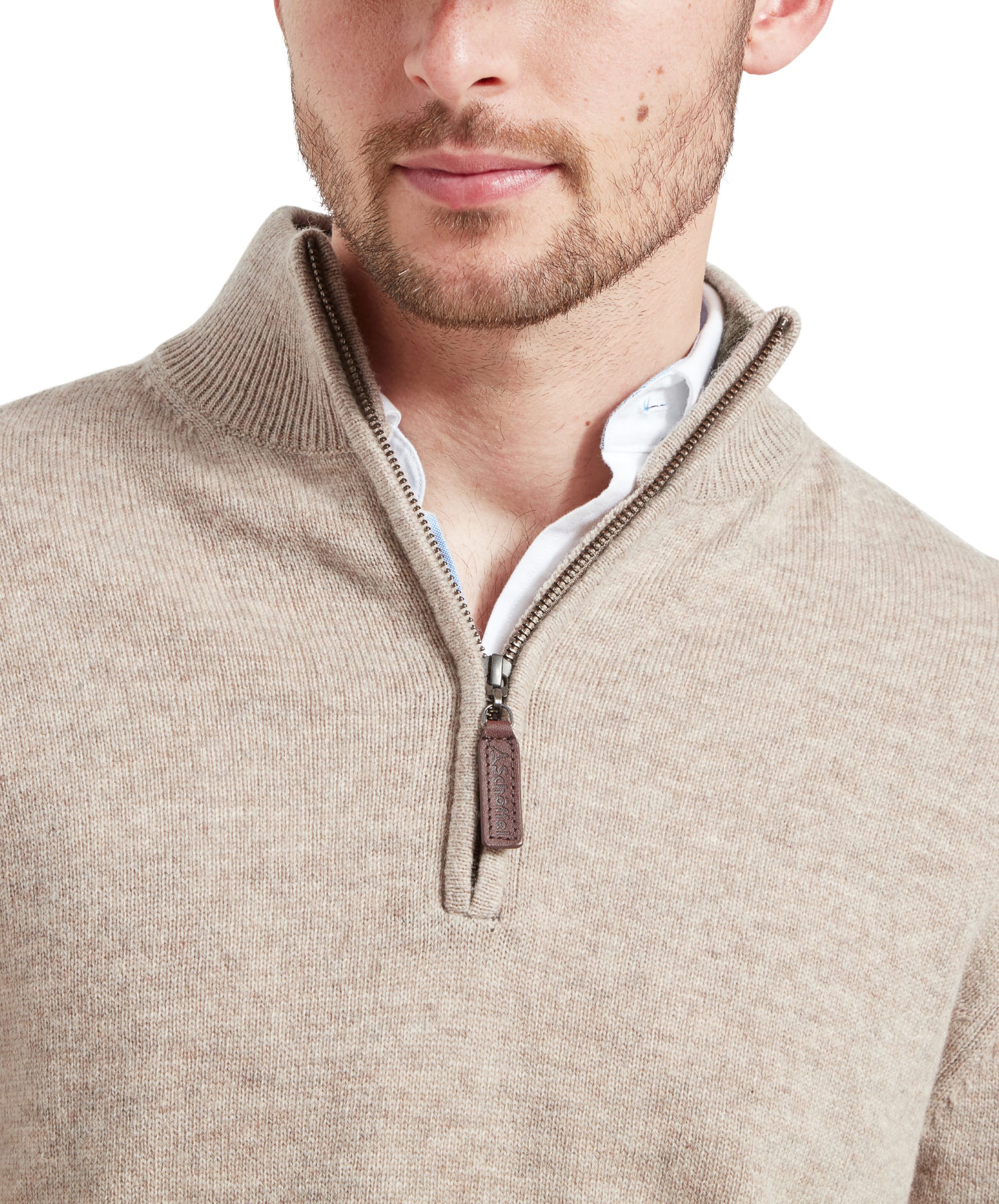 Close-up of the zip on the Schöffel Lambswool 1/4 Zip for Men in Light Brown hightlighting the faux leather zip pull tab.