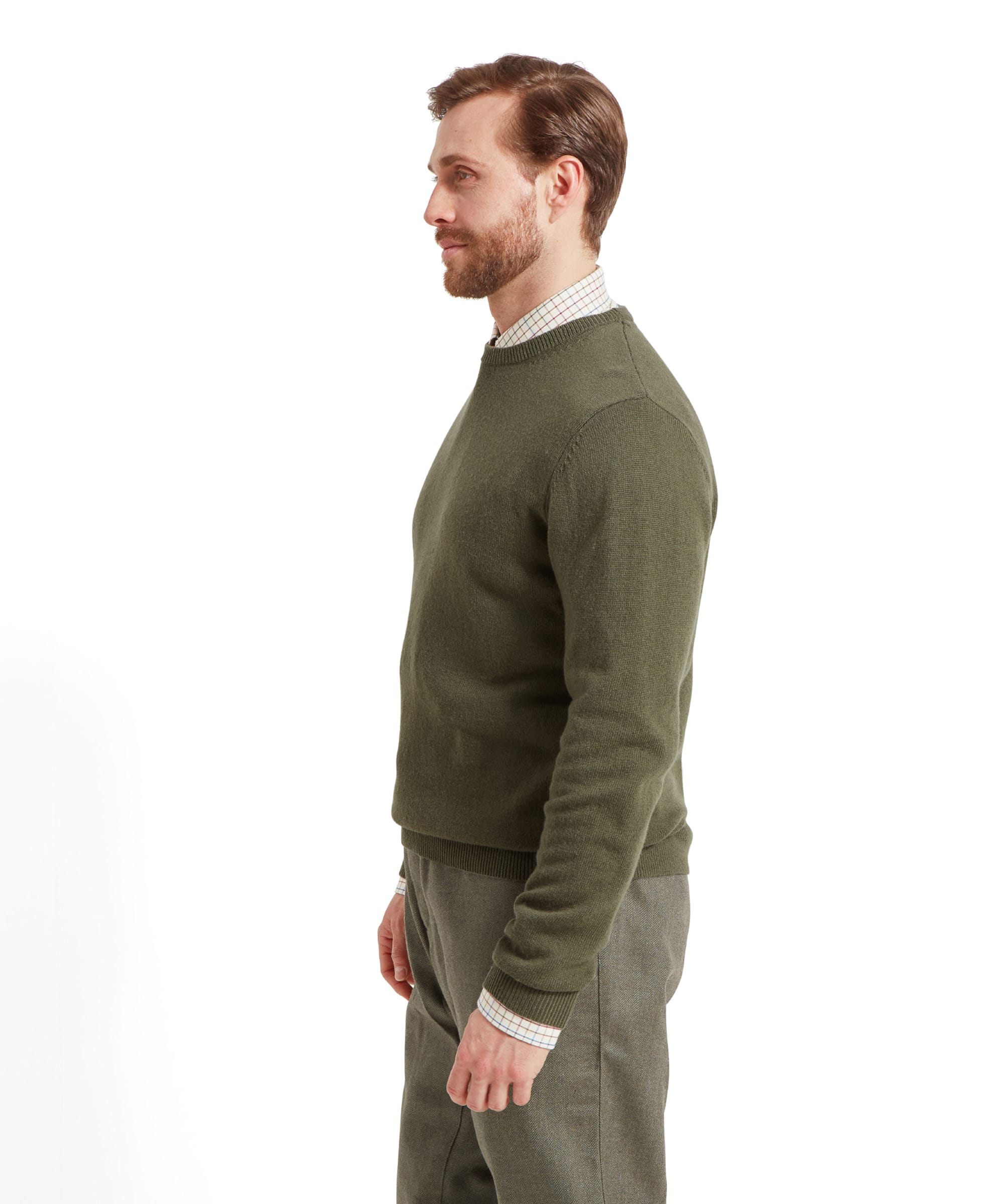 A side view of the Schöffel Lambswool 1/4 Zip for Men in Green