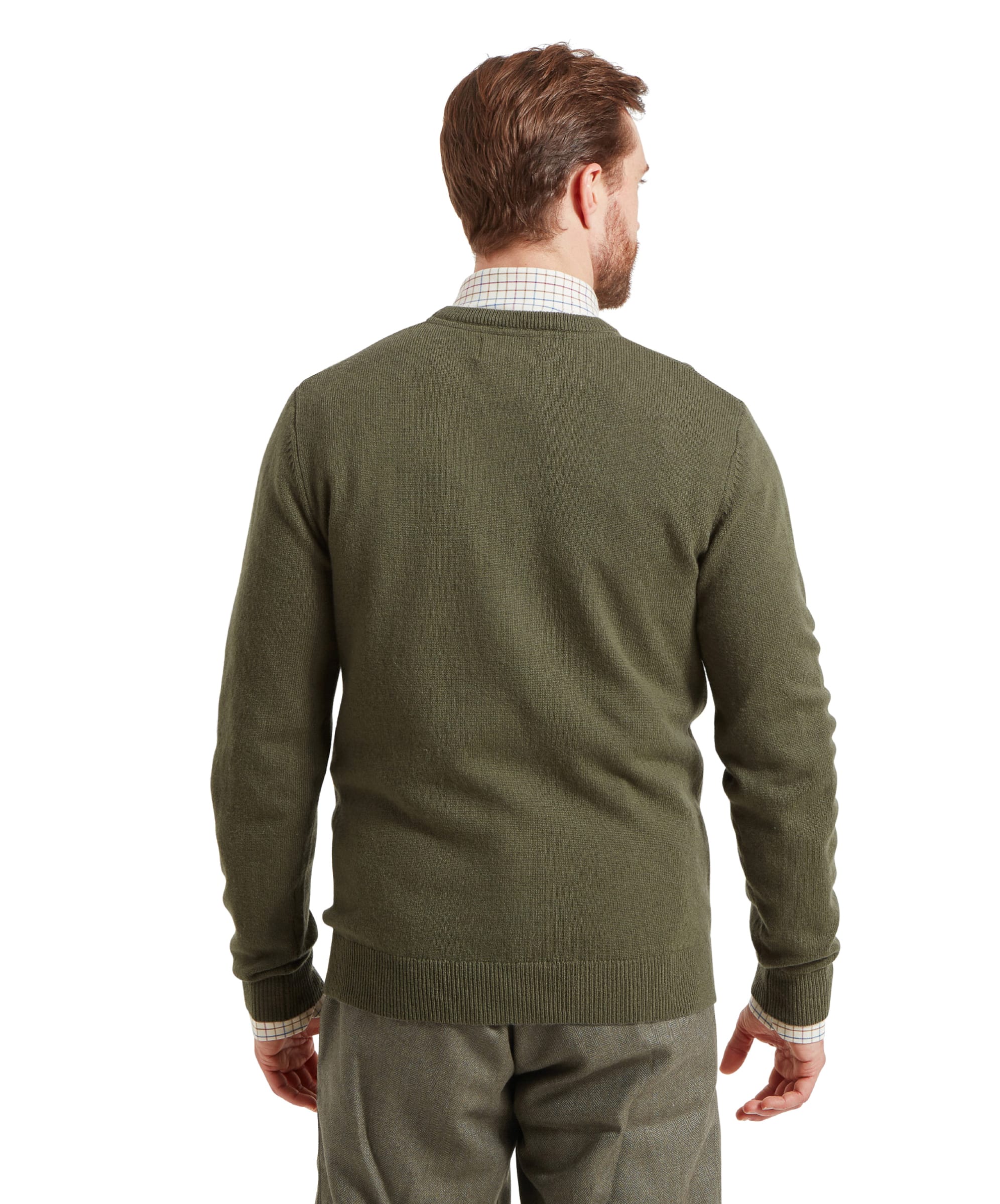 Back view of the same man wearing the Schöffel Lambswool 1/4 Zip for Men in Green highlighting the fit and design.