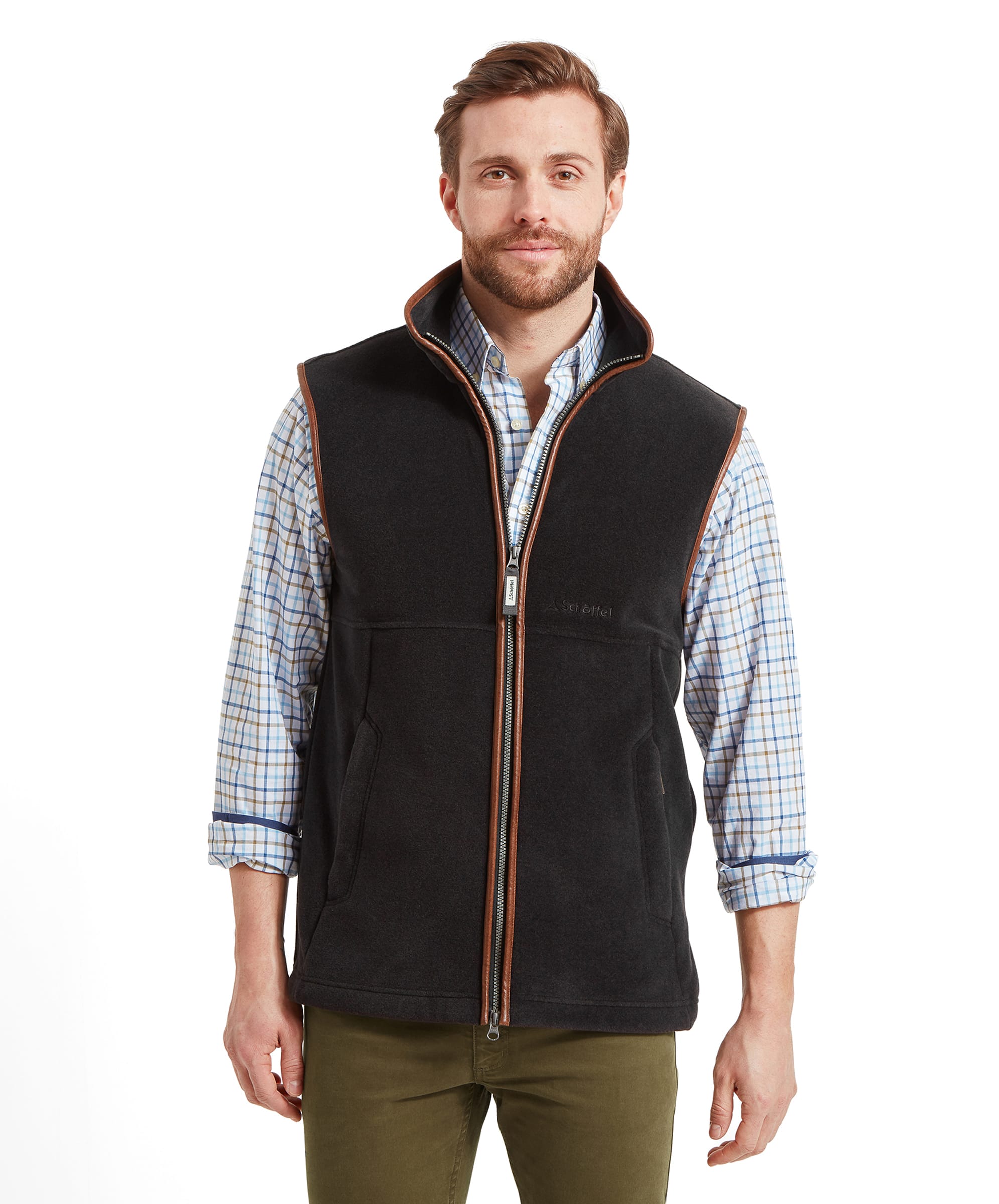 Front view of a man wearing a Schöffel Oakham Fleece Gilet for Men in Grey over a checkered shirt.