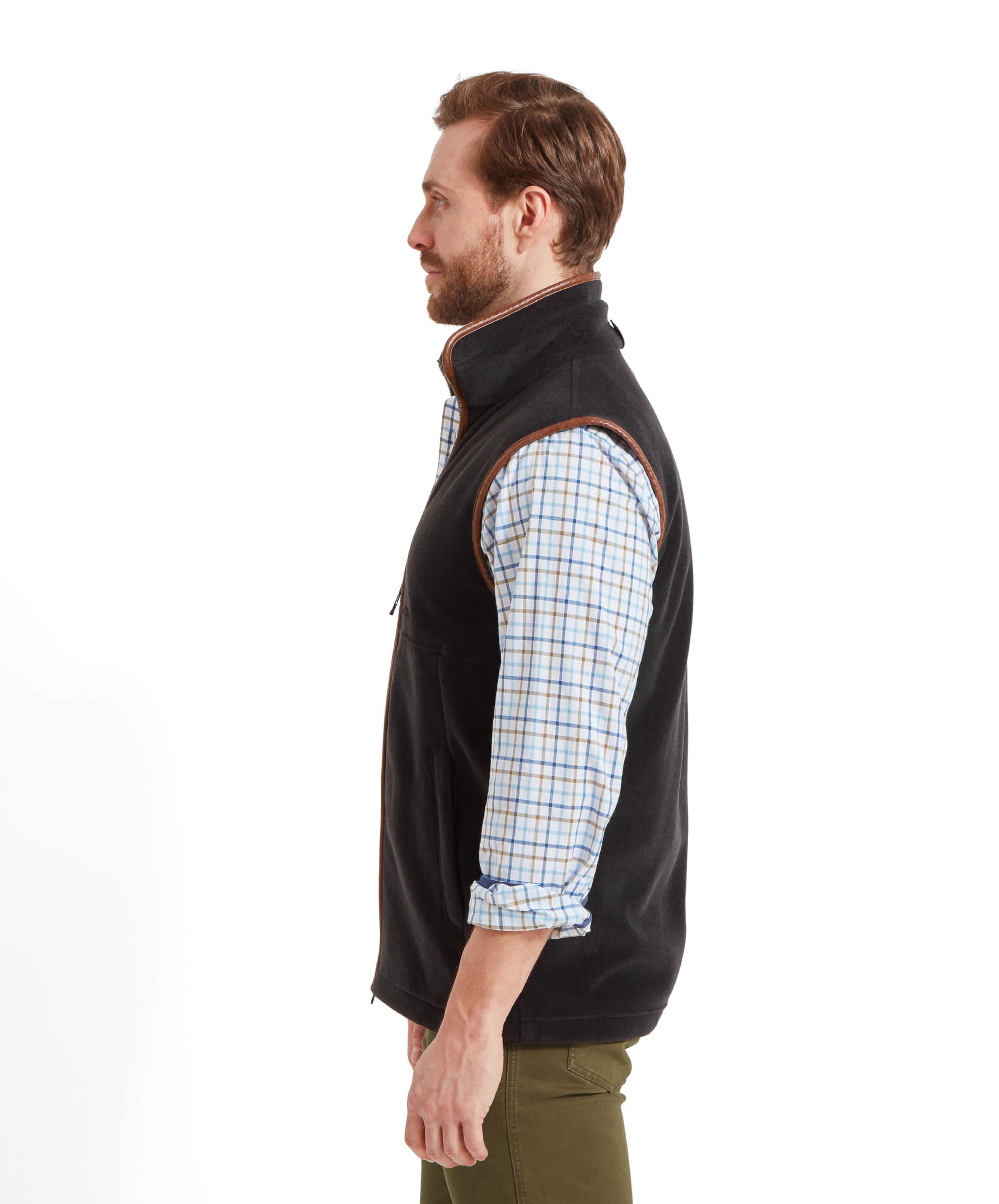 Side profile of the Schöffel Oakham Fleece Gilet for Men in Grey, highlighting the fit and design.