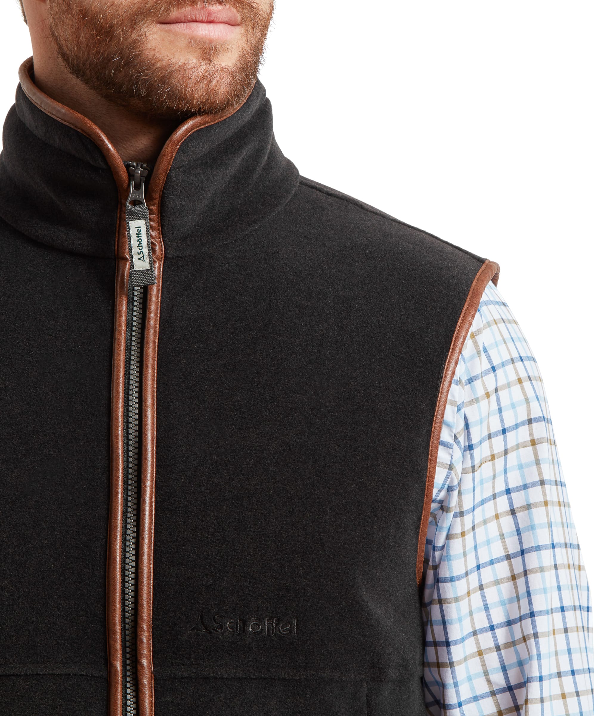 Close-up of the front zipper and logo, highlighting the Schöffel Oakham Fleece Gilet for Men in Grey's craftsmanship.