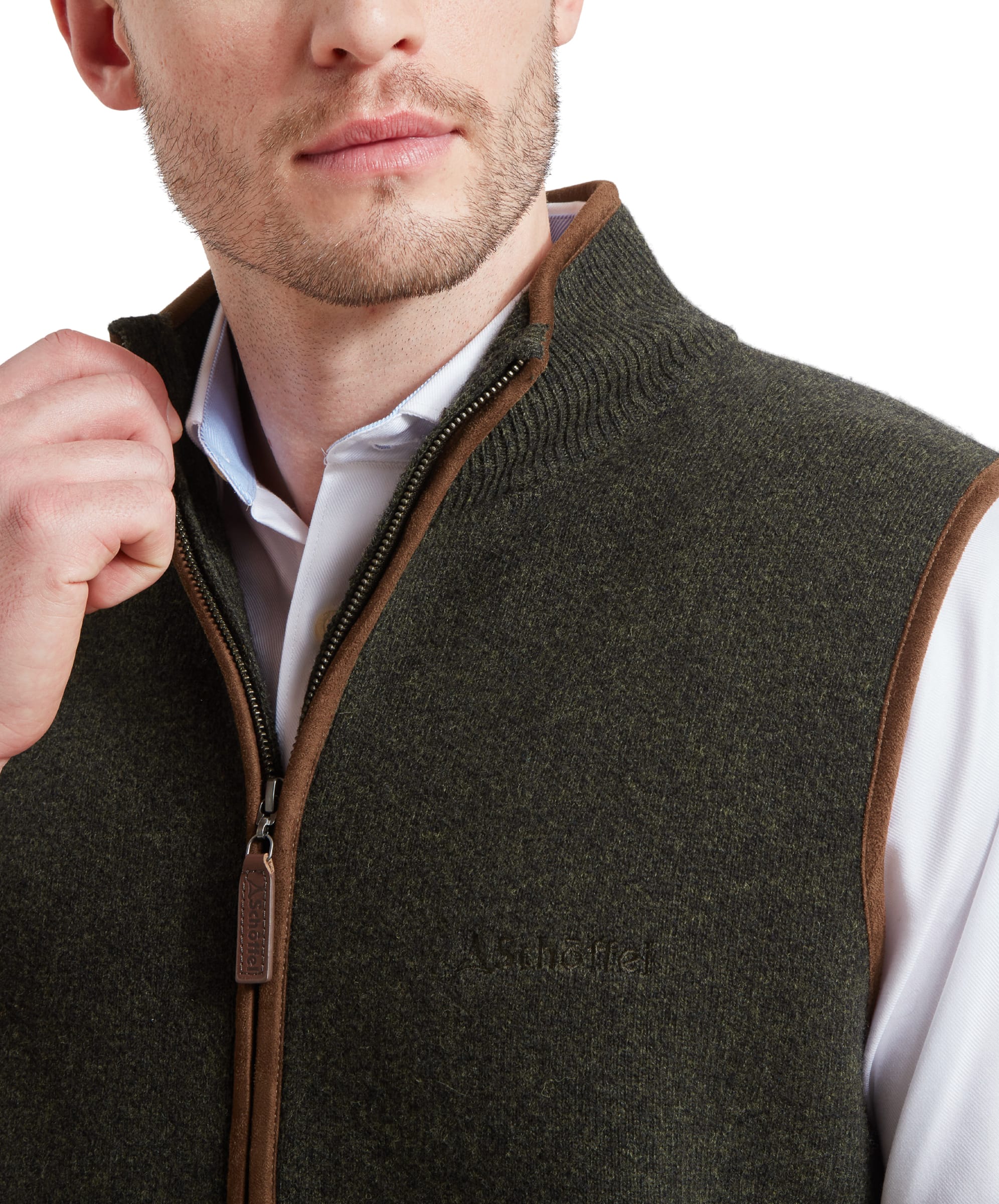 A close-up of the chest area of the Schöffel Orkney Merino Gilet for Men in Green, highlighting the zipper and collar detailing.