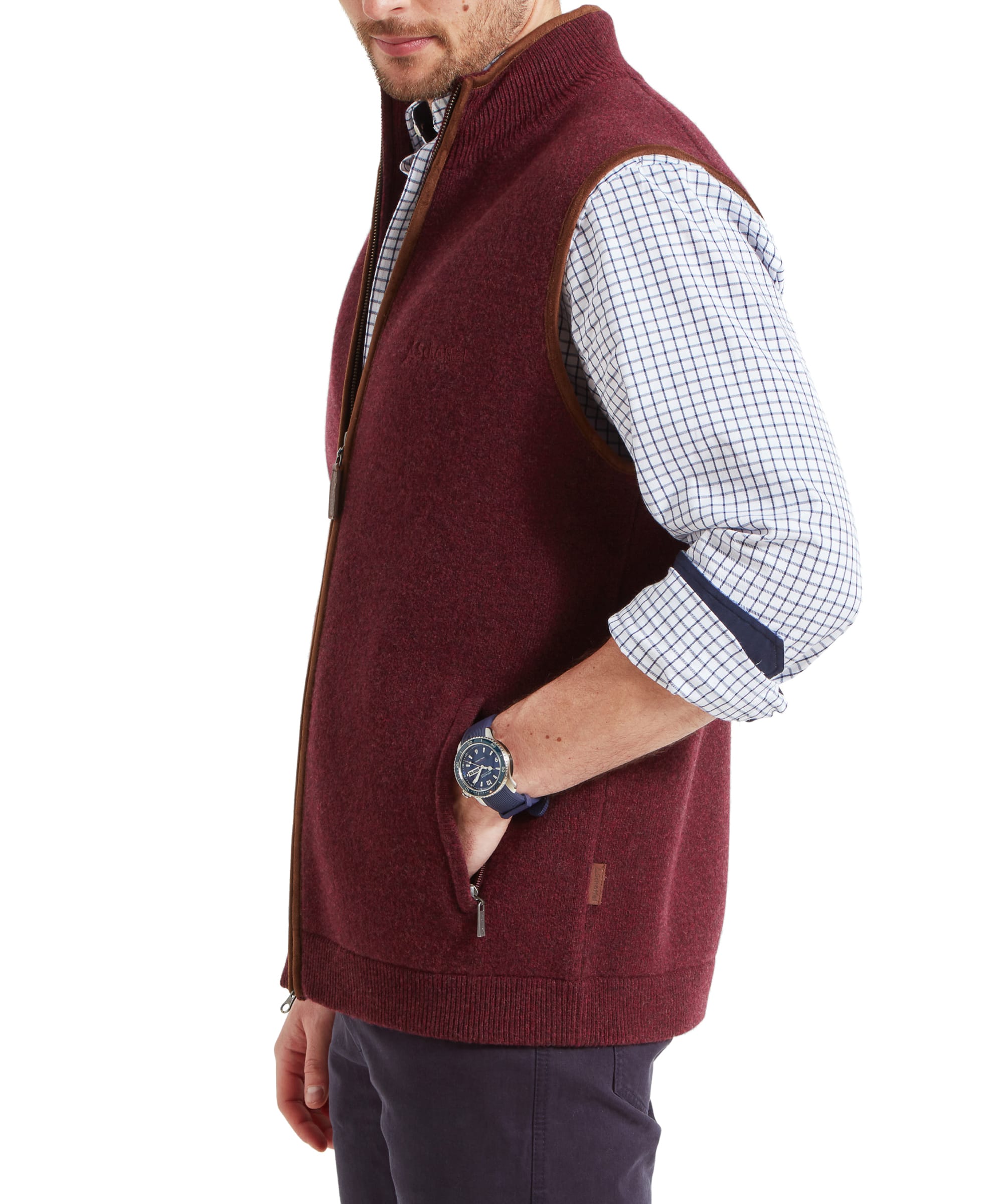 Side profile of the Schöffel Orkney Merino Gilet for Men in Red, highlighting the gilet’s tailored fit.