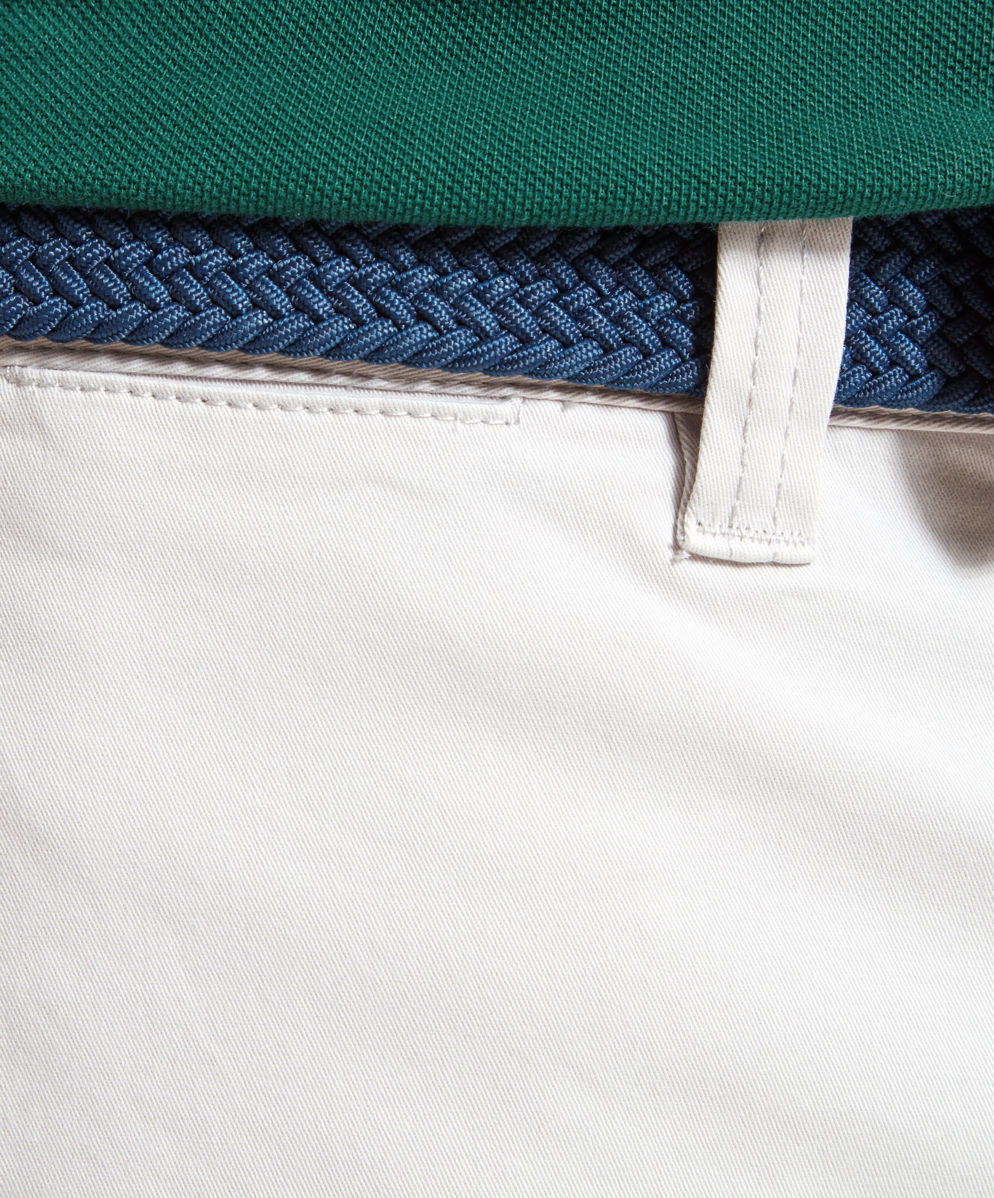 Detail shot of the fabric and belt loop of Schöffel Paul Shorts for Men in Light Grey.