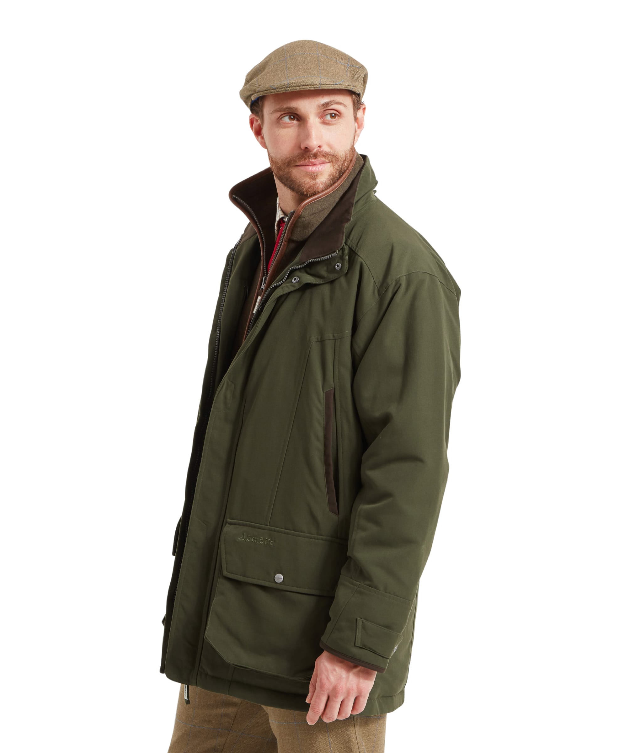 Side view of the Schöffel Ptarmigan Classic Coat for Men in Green, showing the coat's sleek profile and the man's thoughtful expression, with one hand in the pocket.